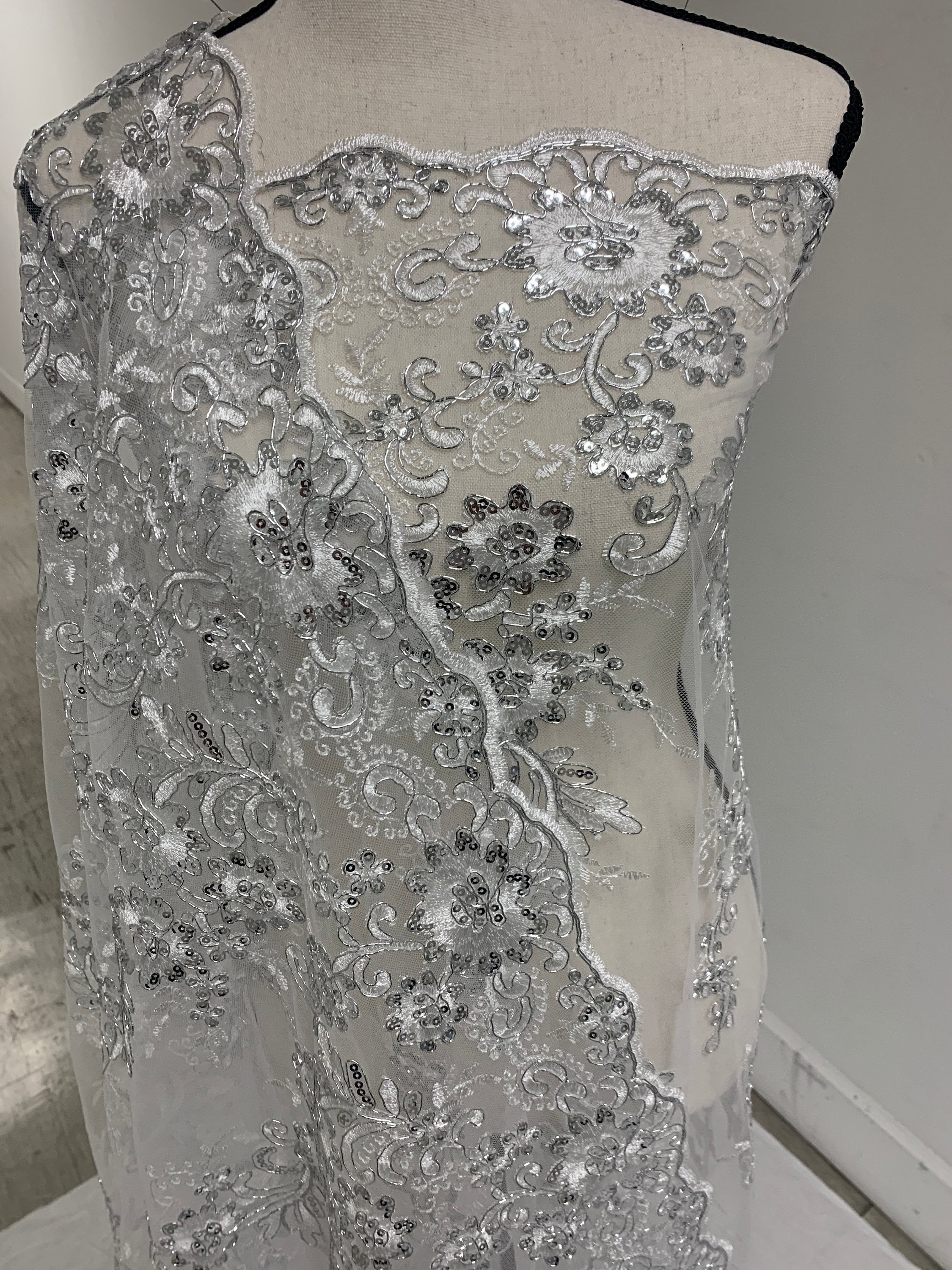 3 yards cut Lace color Silver. Double scalloped sequence embroidered width 49/50 inches. condition New. sell by yard. Des: Eu 230325 016 BNG