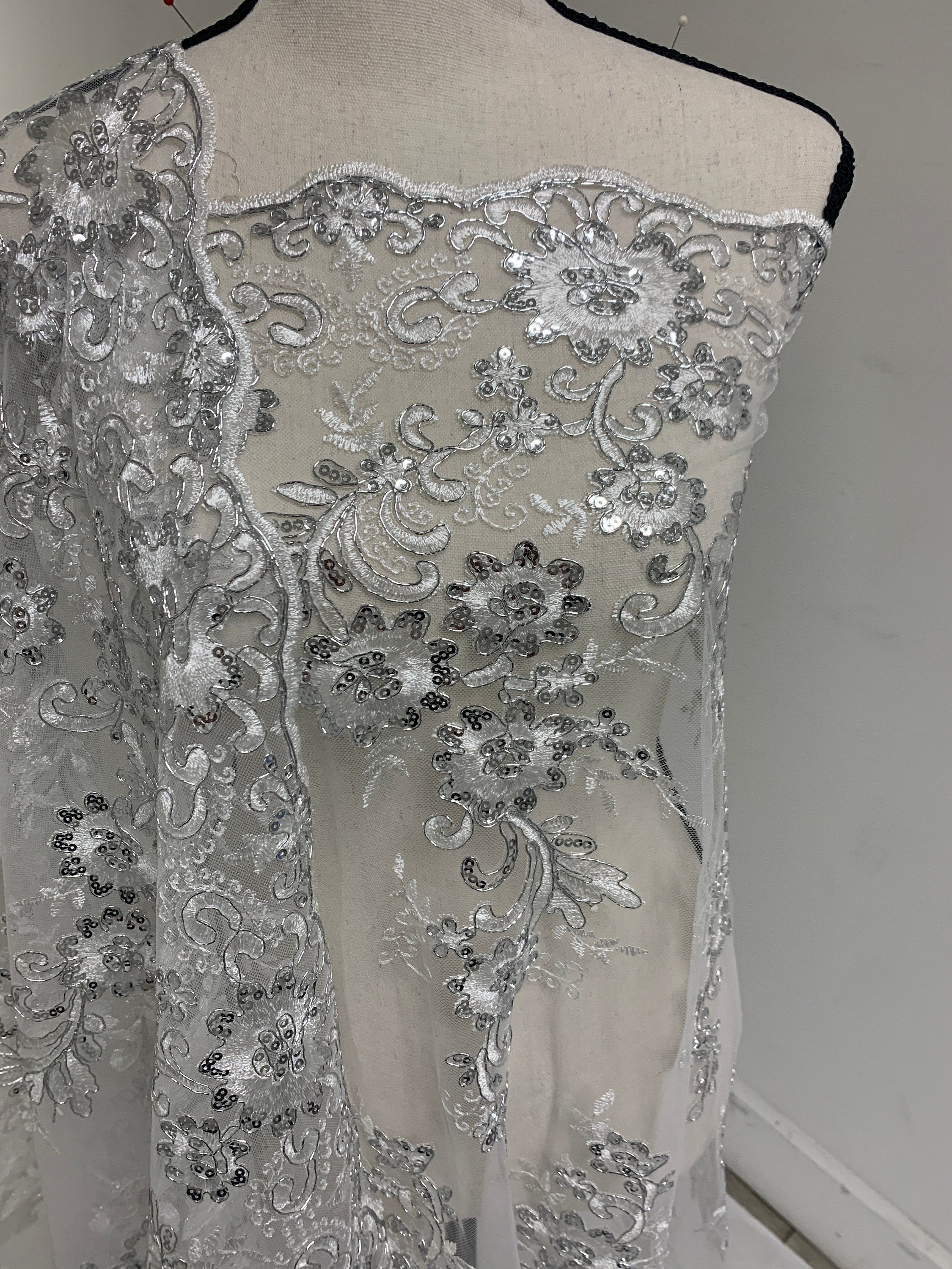 3 yards cut Lace color Silver. Double scalloped sequence embroidered width 49/50 inches. condition New. sell by yard. Des: Eu 230325 016 BNG