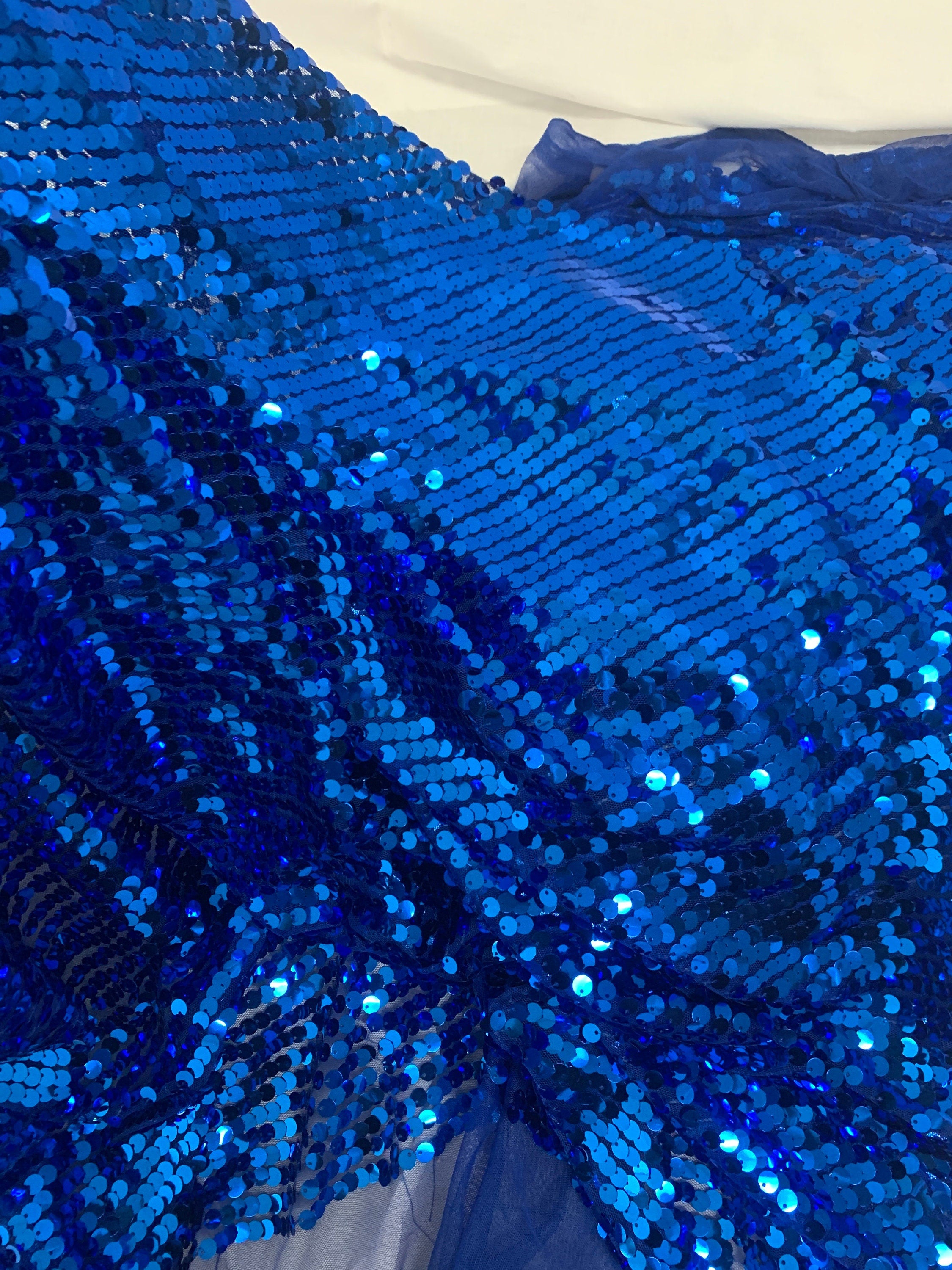 3 yards cut Royal Sequins fabric.