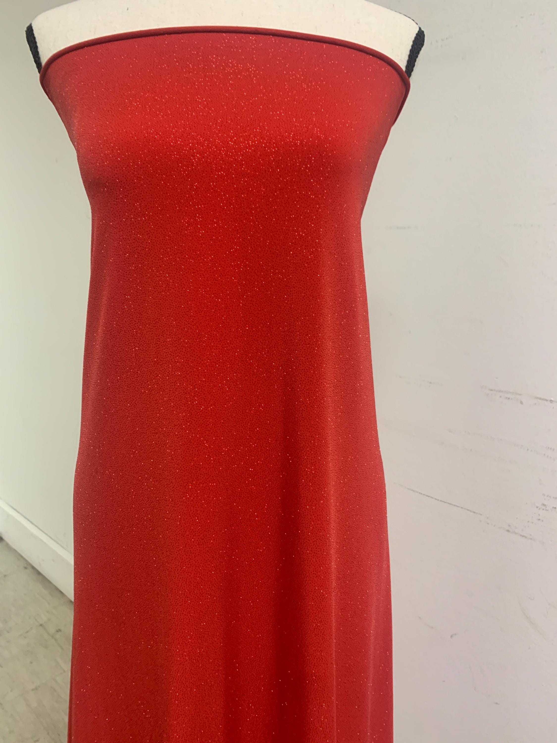 Red Gliter stretch Fabric width 58/60" , know as ity sells by 1 yard continues increment. polyester spandex.