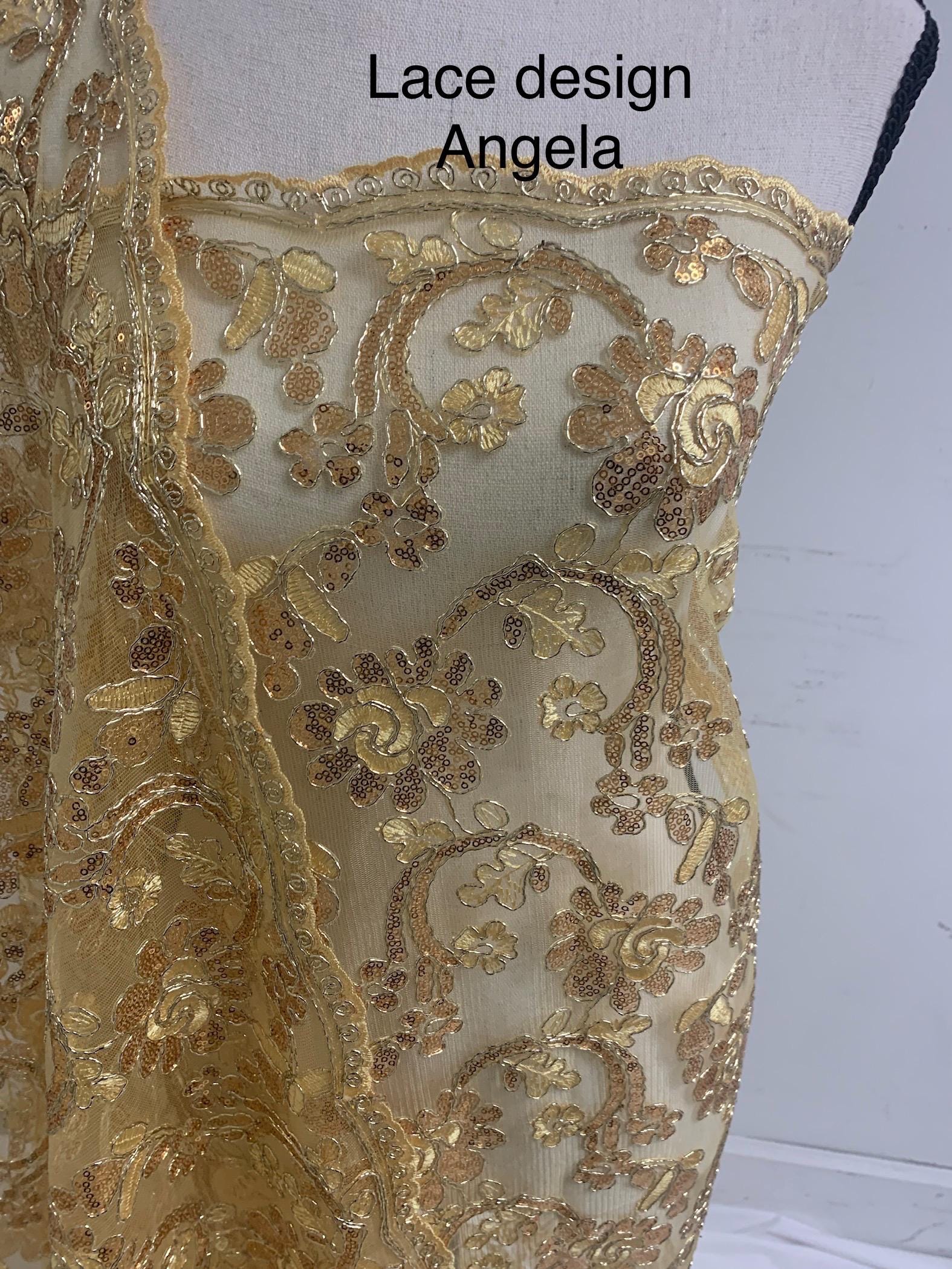 3-yard Gold-colored lace fabric design named Angela, sequins and intricate embroidery with double scalloped edges. Width 49/50"