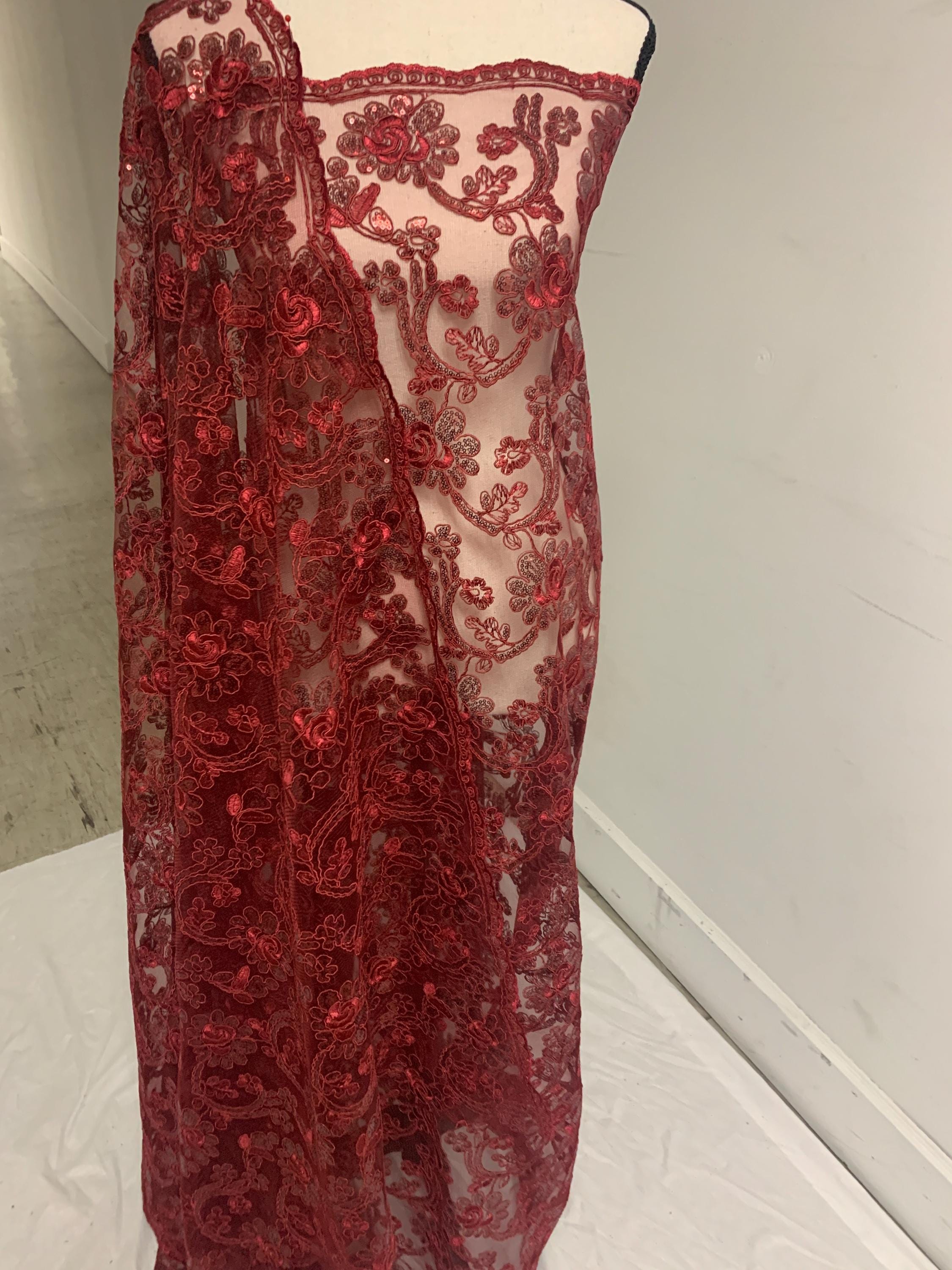 3-yard Burgundy-colored lace fabric design named Angela, sequins and intricate embroidery with double scalloped edges. Width 49/50"
