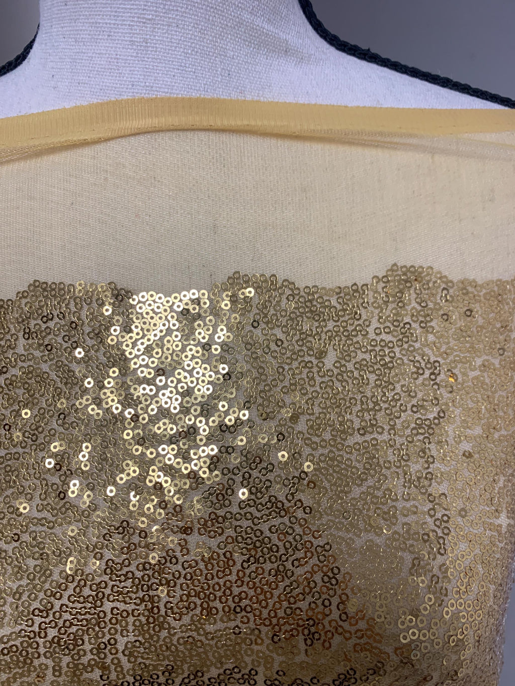 Gold color sequins mesh fabric. common use in craft, jacket, costume, dull, table runner, color gold.