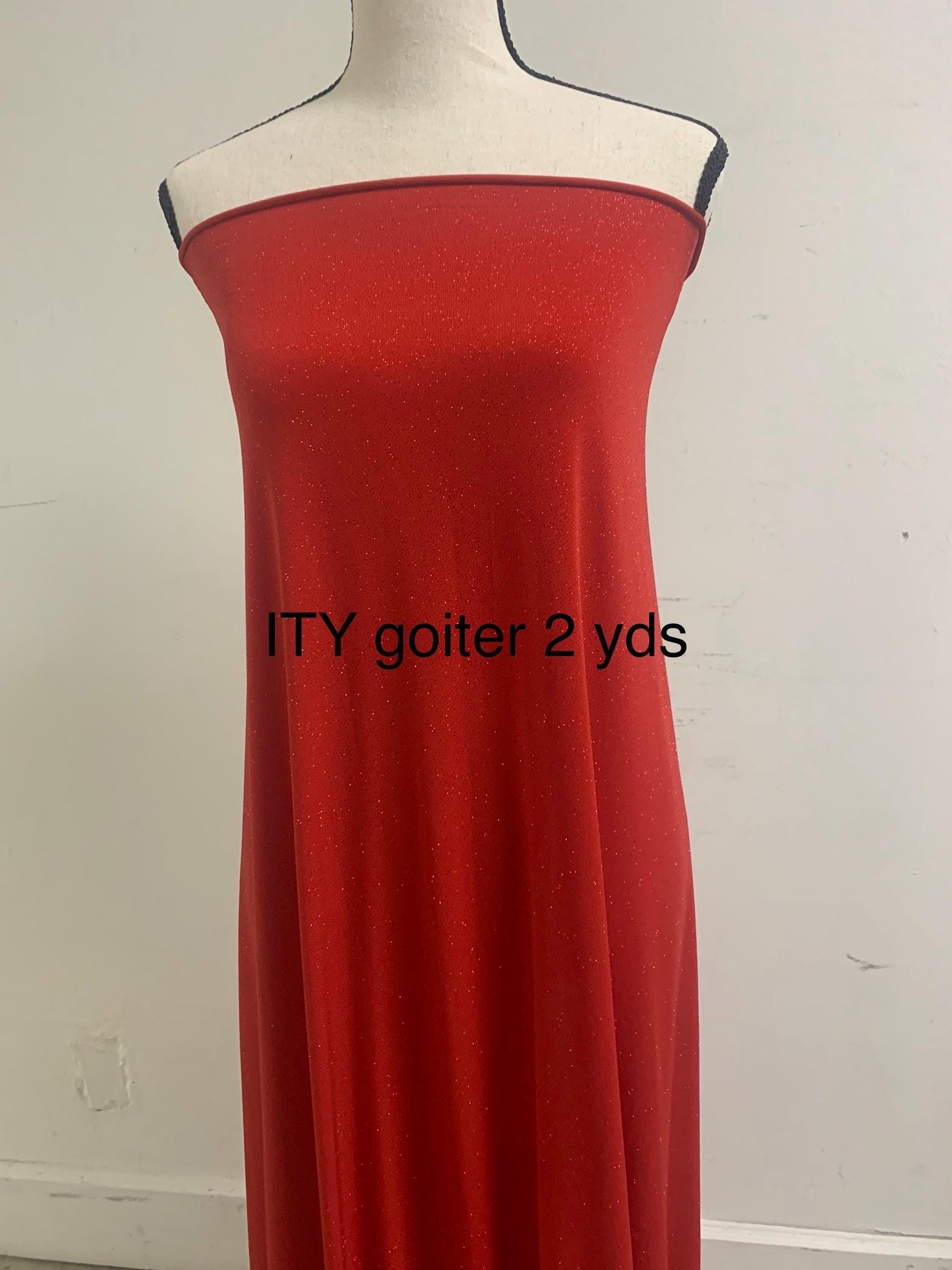 Red Gliter stretch Fabric width 58/60" , know as ity sells by 1 yard continues increment. polyester spandex.