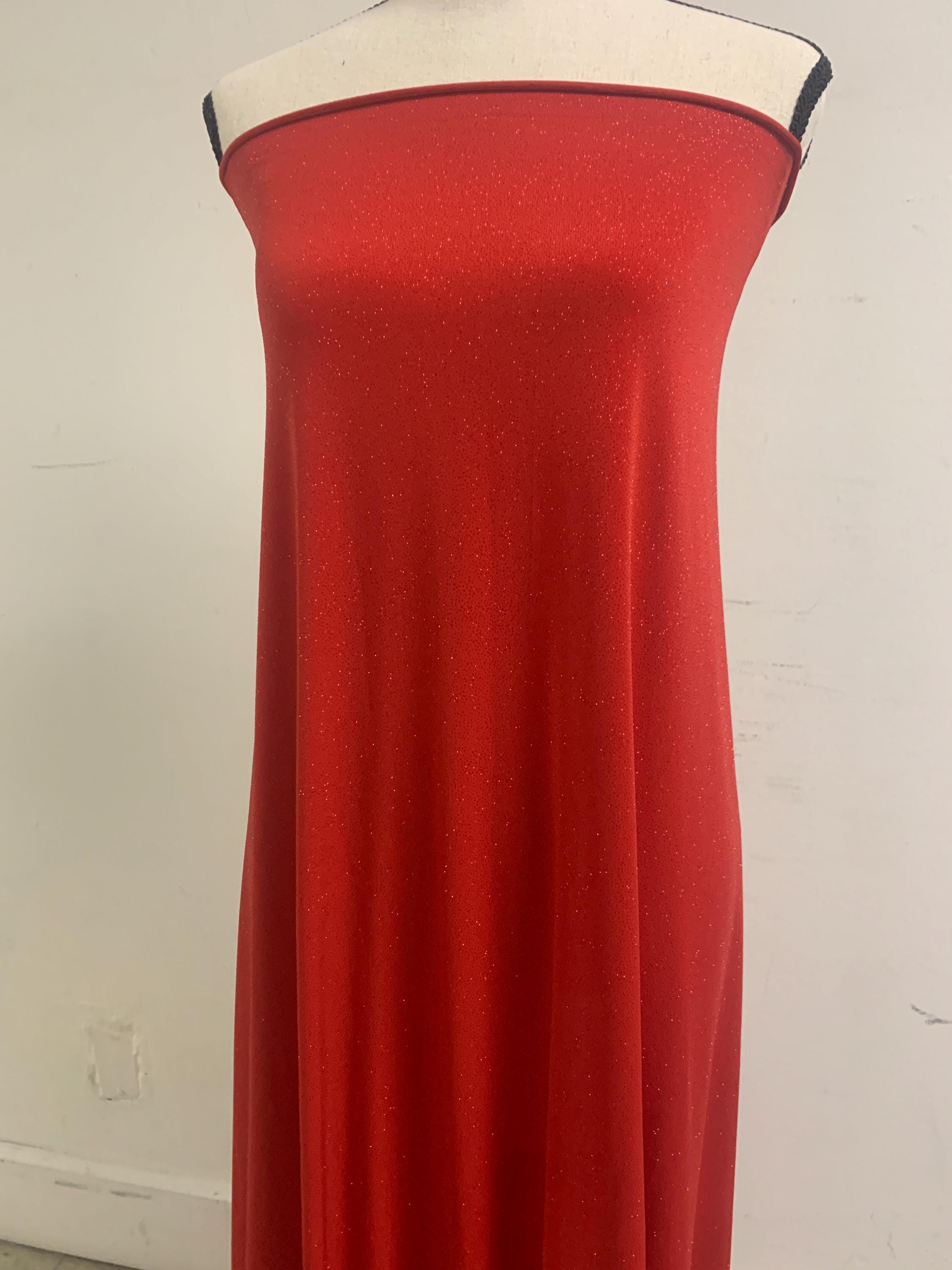 Red Gliter stretch Fabric width 58/60" , know as ity sells by 1 yard continues increment. polyester spandex.