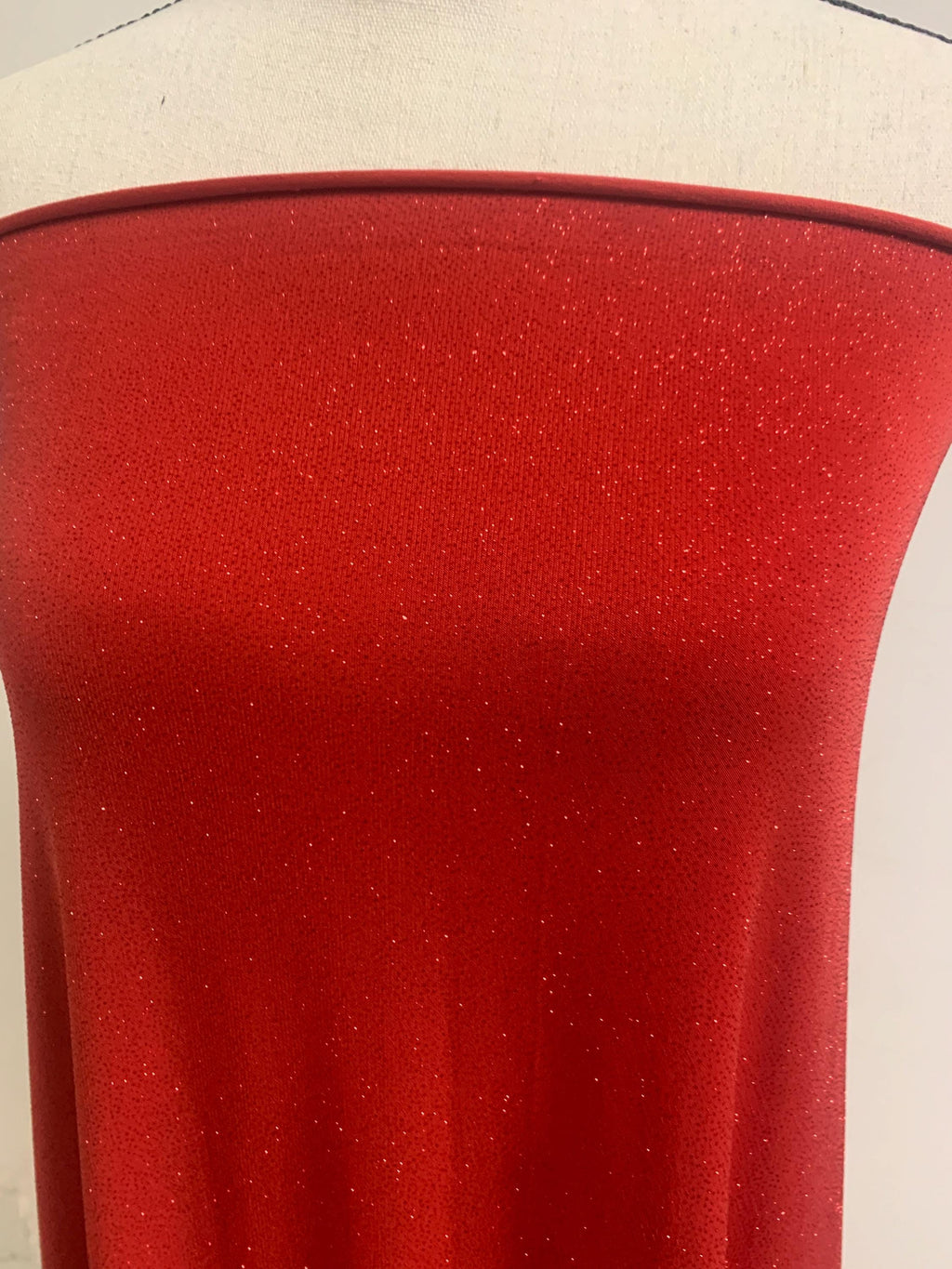 Red Gliter stretch Fabric width 58/60" , know as ity sells by 1 yard continues increment. polyester spandex.