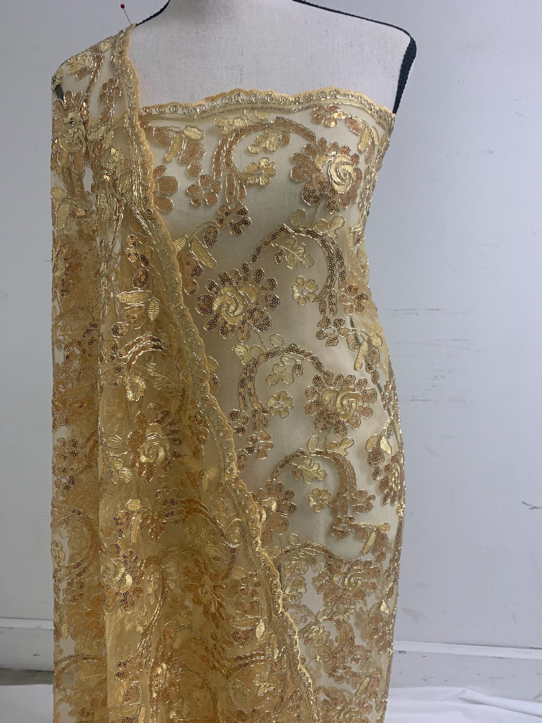 3-yard Gold-colored lace fabric design named Angela, sequins and intricate embroidery with double scalloped edges. Width 49/50"
