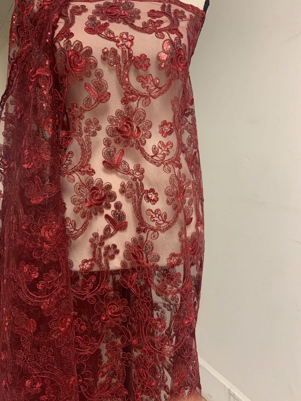 3-yard Burgundy-colored lace fabric design named Angela, sequins and intricate embroidery with double scalloped edges. Width 49/50"