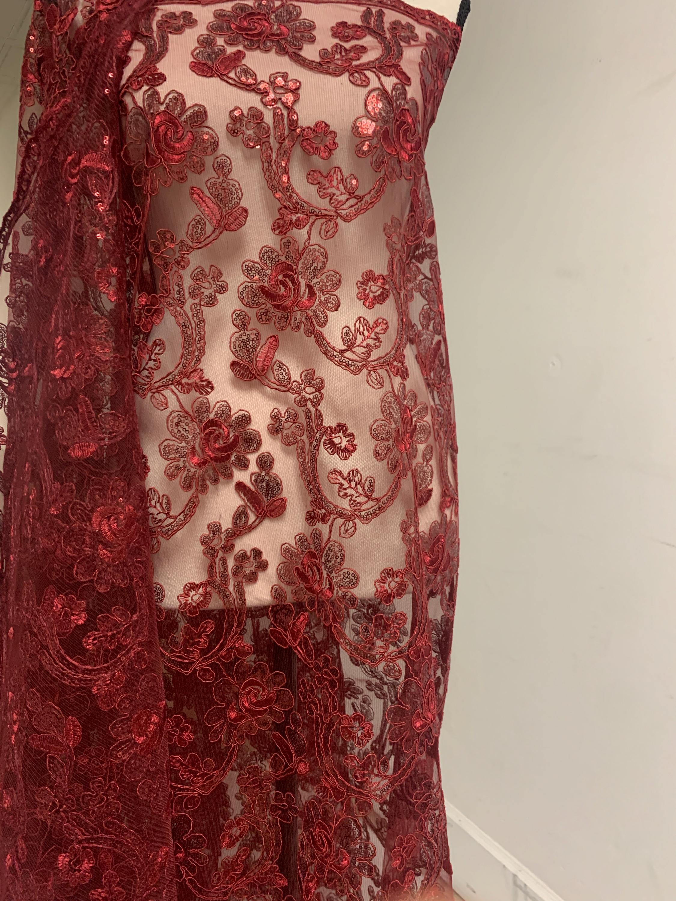 3-yard Burgundy-colored lace fabric design named Angela, sequins and intricate embroidery with double scalloped edges. Width 49/50"