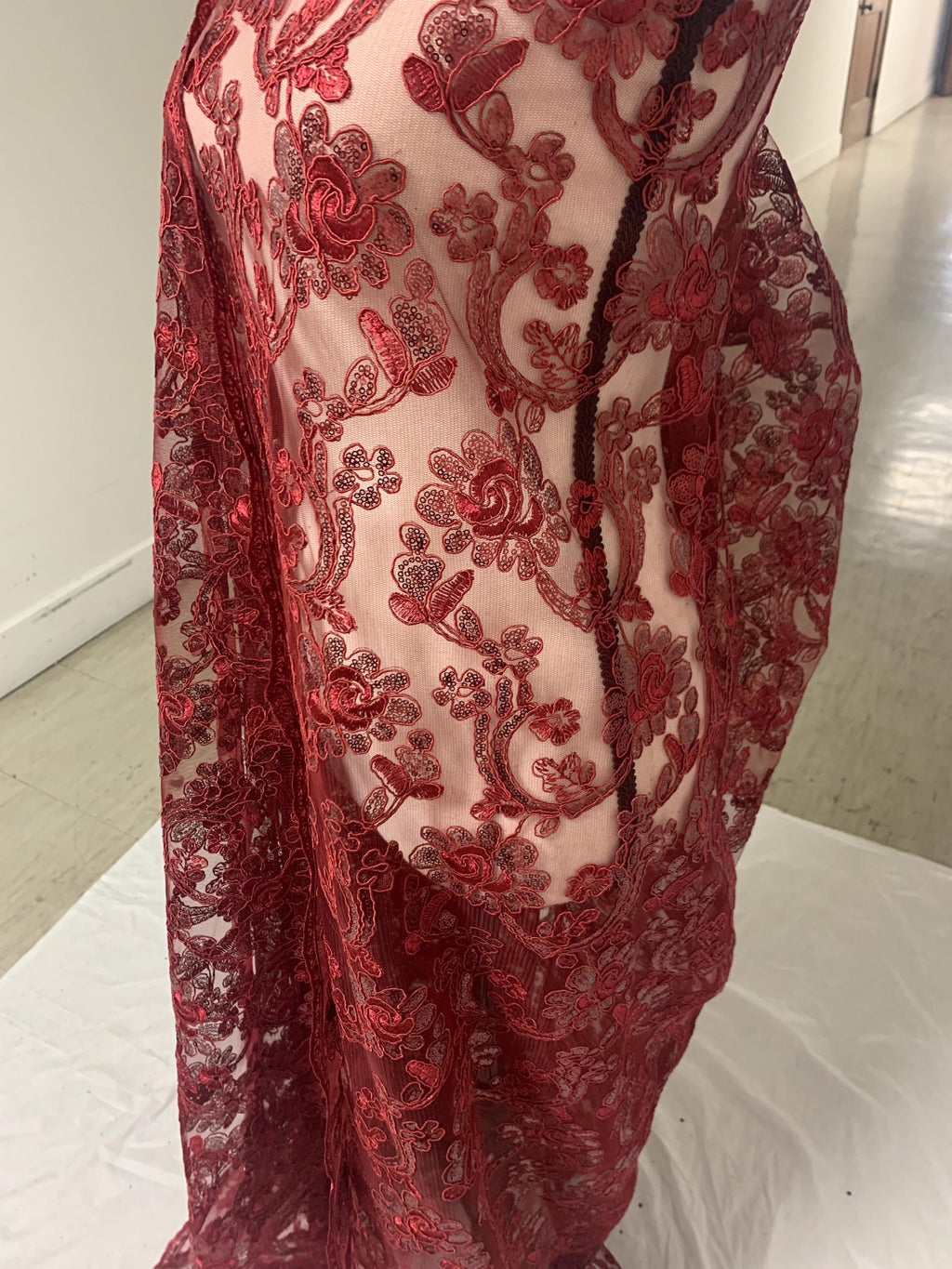 3-yard Burgundy-colored lace fabric design named Angela, sequins and intricate embroidery with double scalloped edges. Width 49/50"