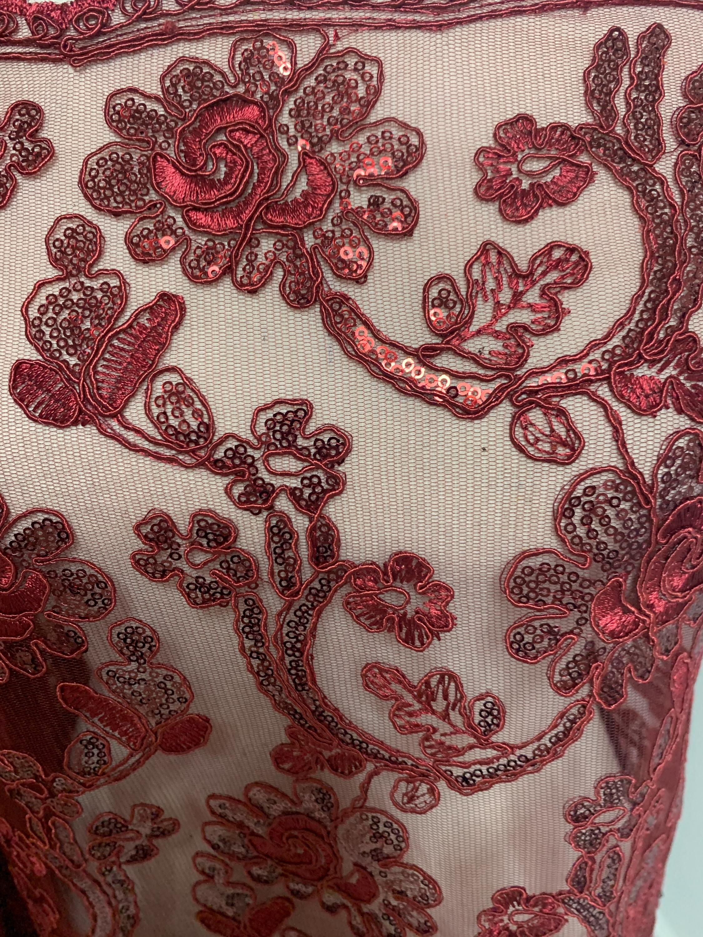 3-yard Burgundy-colored lace fabric design named Angela, sequins and intricate embroidery with double scalloped edges. Width 49/50"