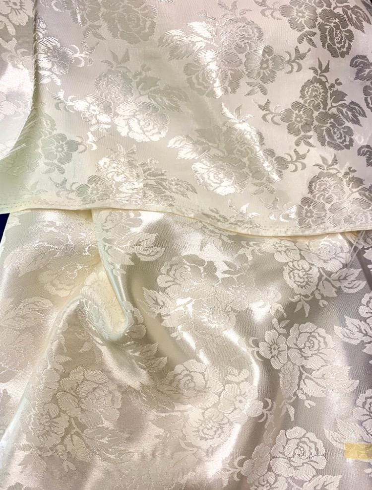 Satin Jacquard Fabric. Color ivory 100% polyester flower design width 58 inch. free sample.