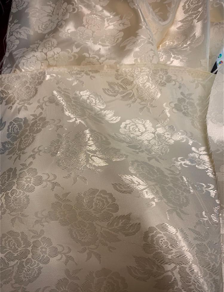 Satin Jacquard Fabric. Color ivory 100% polyester flower design width 58 inch. free sample.