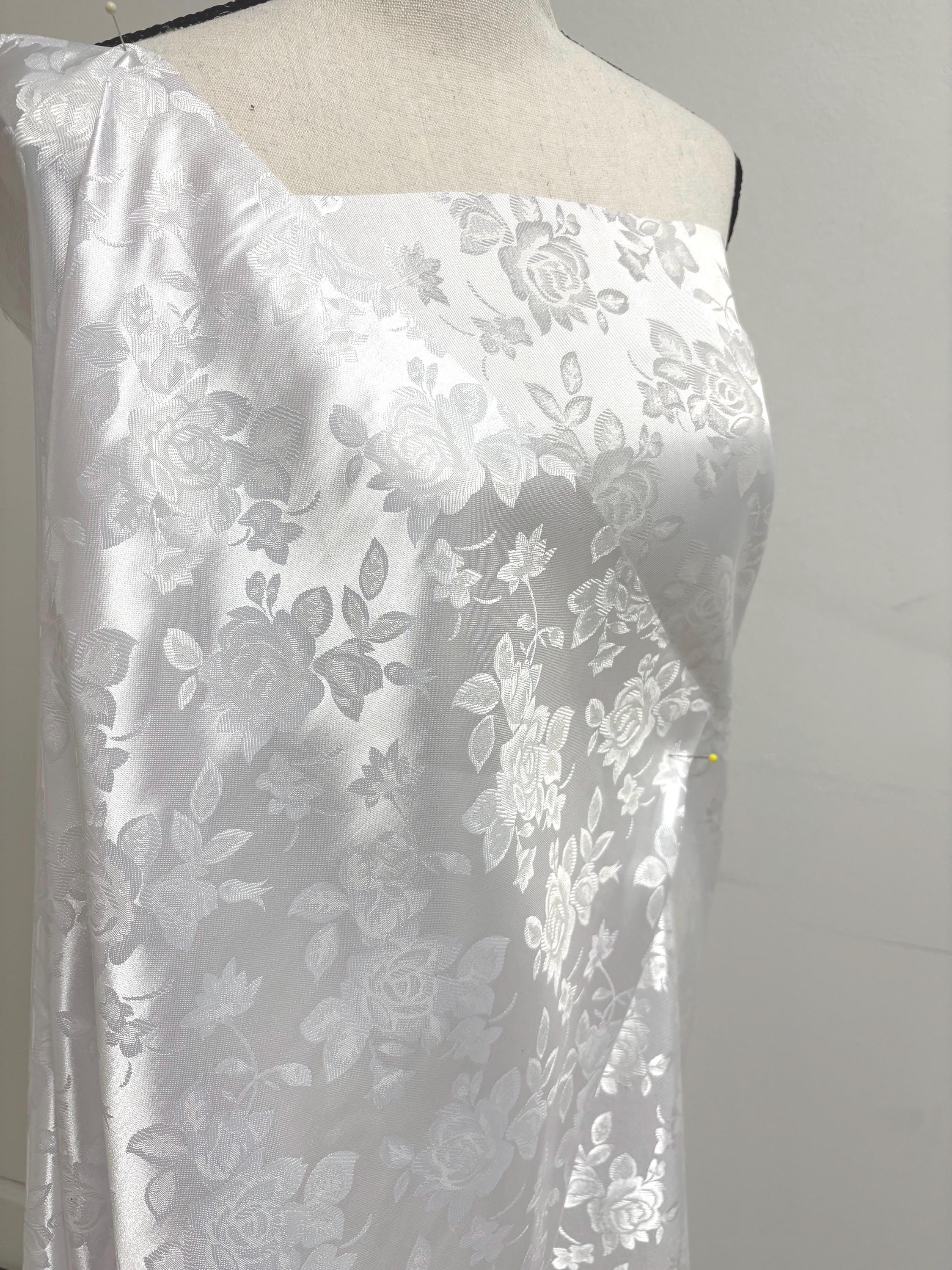 A 2 yards White Satin Jacquard fabric 100% poly color white 58" width Polyester Fabric. sell by 2 yards increment continues. free sample
