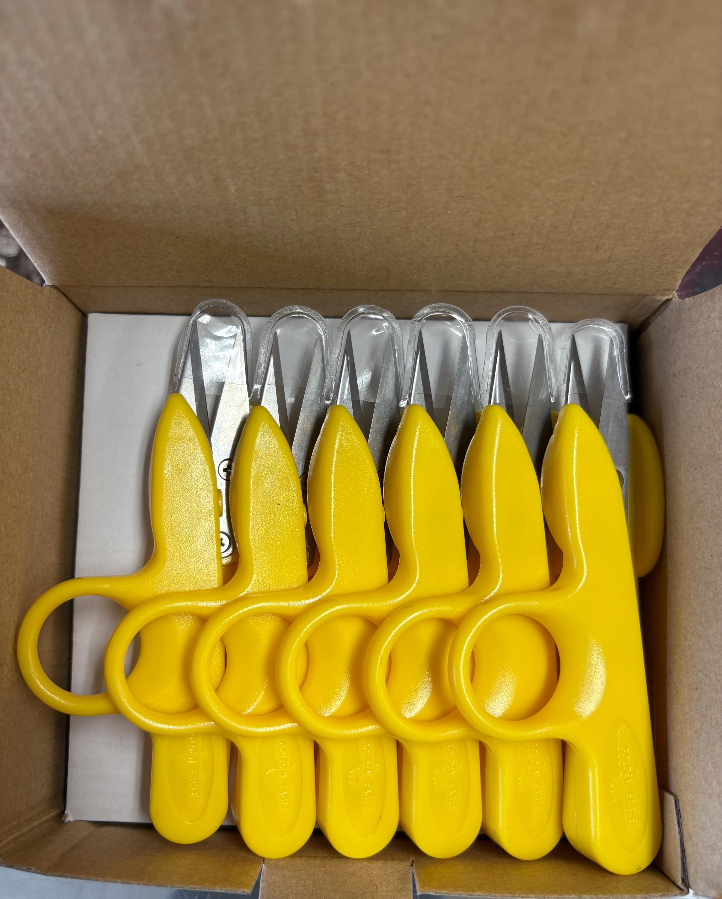 Thread cutter scissor a box of 12 yellow color.