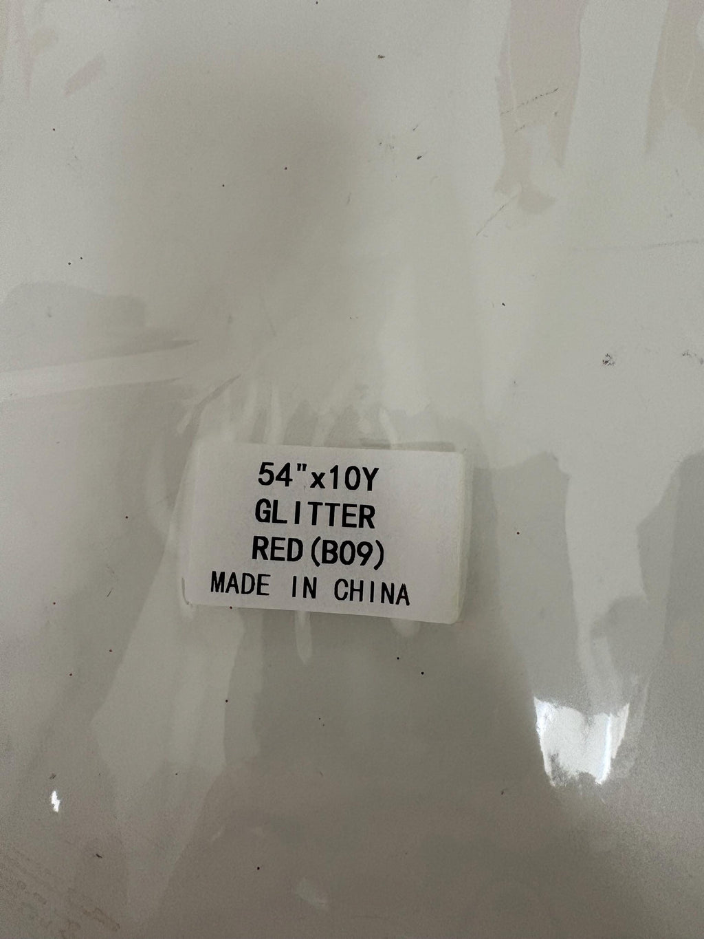 Red tulle with gliter 10 yards bolt, 54 inch width double fold, polyester.