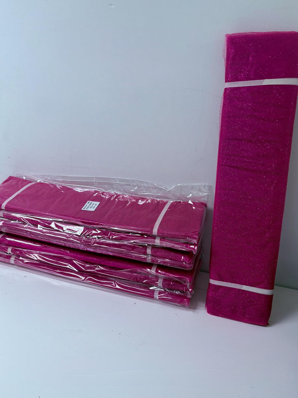 Fucshia tulle with gliter 10 yards bolt, 54 inch width double fold, polyester.