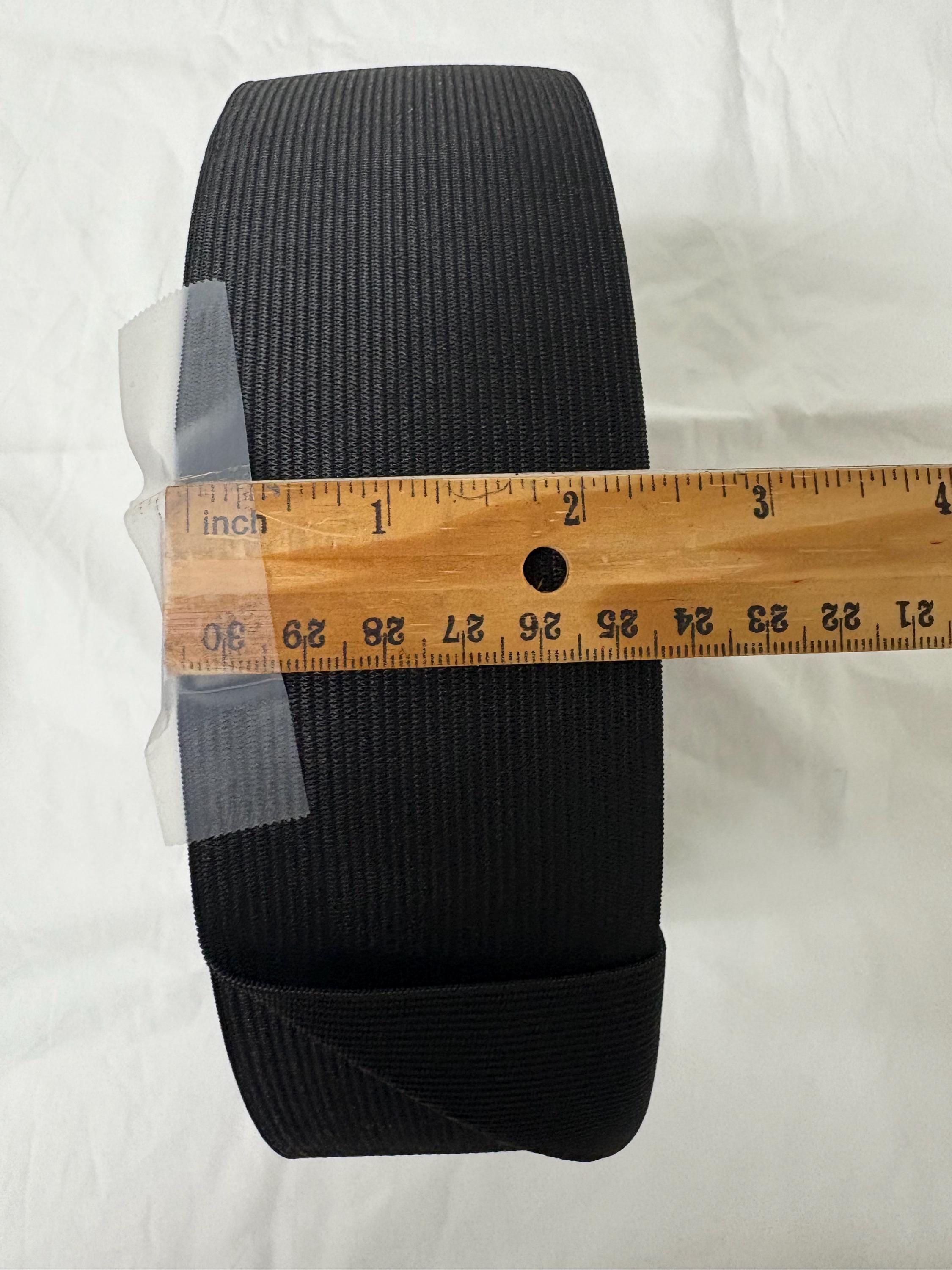 Elastic black 2 1/2 inches wide, 50 yards.