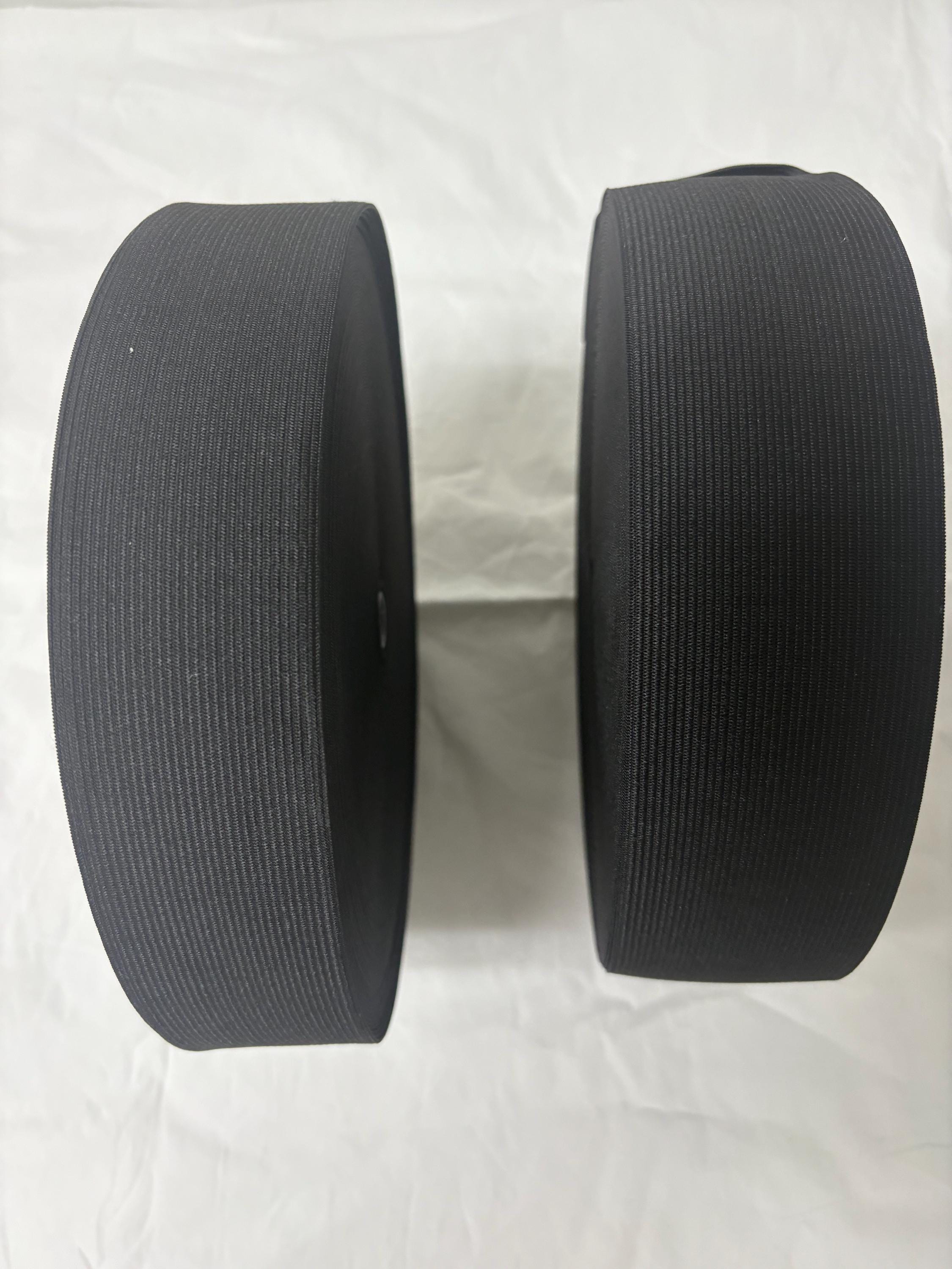 Elastic black 2 1/2 inches wide, 50 yards.