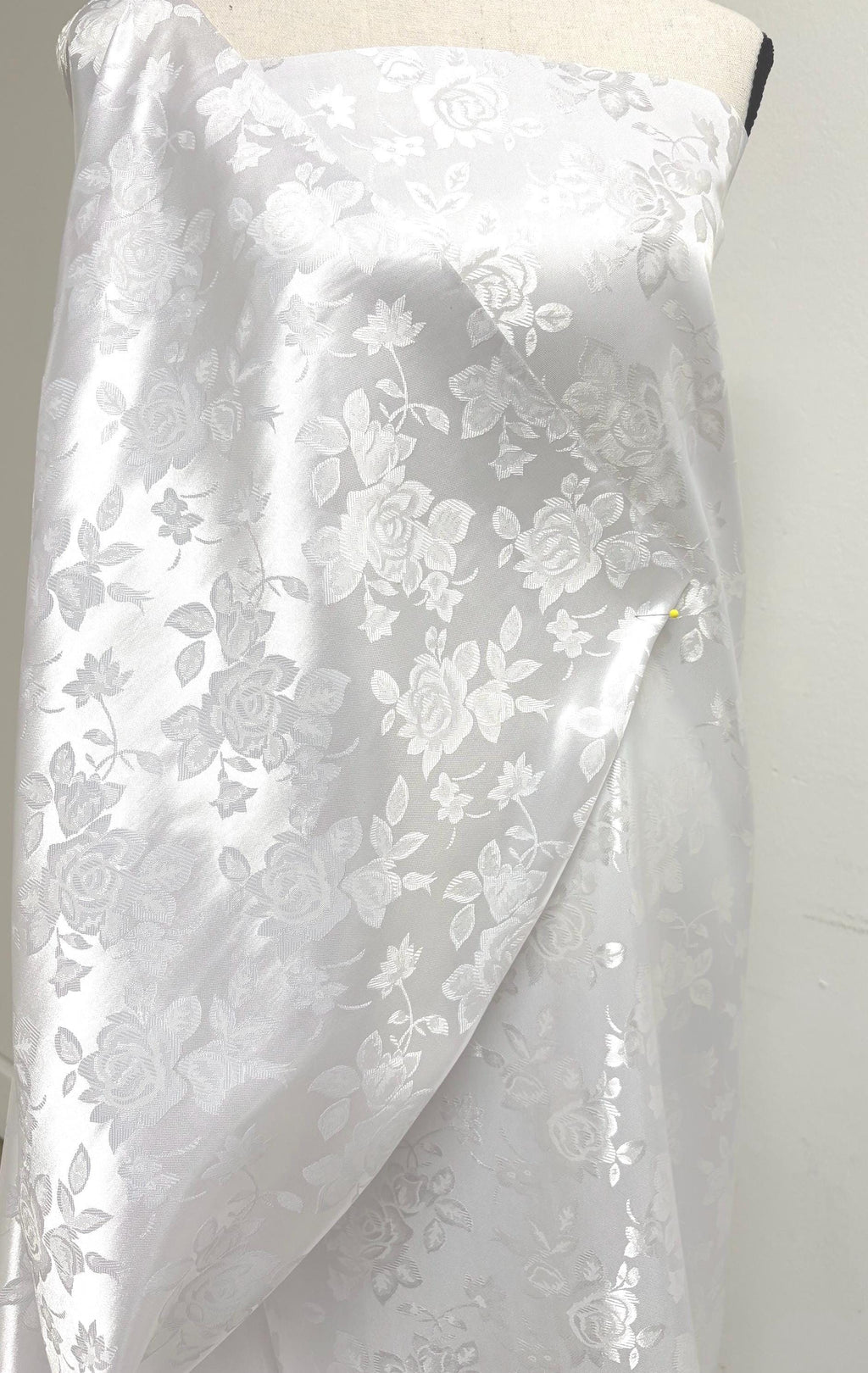 A 2 yards White Satin Jacquard fabric. width 58 inches, polyester sell by 2 yards continuous.