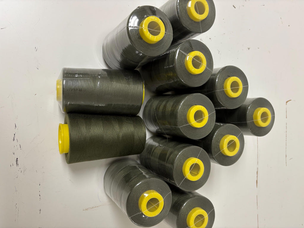 Olive sewing threads, polyester 130 gram per cone, 5000 yards per cone, wrap in clear cover for daily sewing. size 24T. made in usa. PT 945