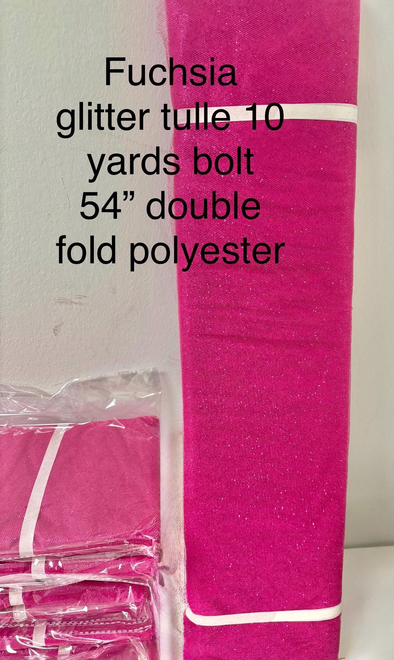 Fucshia tulle with gliter 10 yards bolt, 54 inch width double fold, polyester.