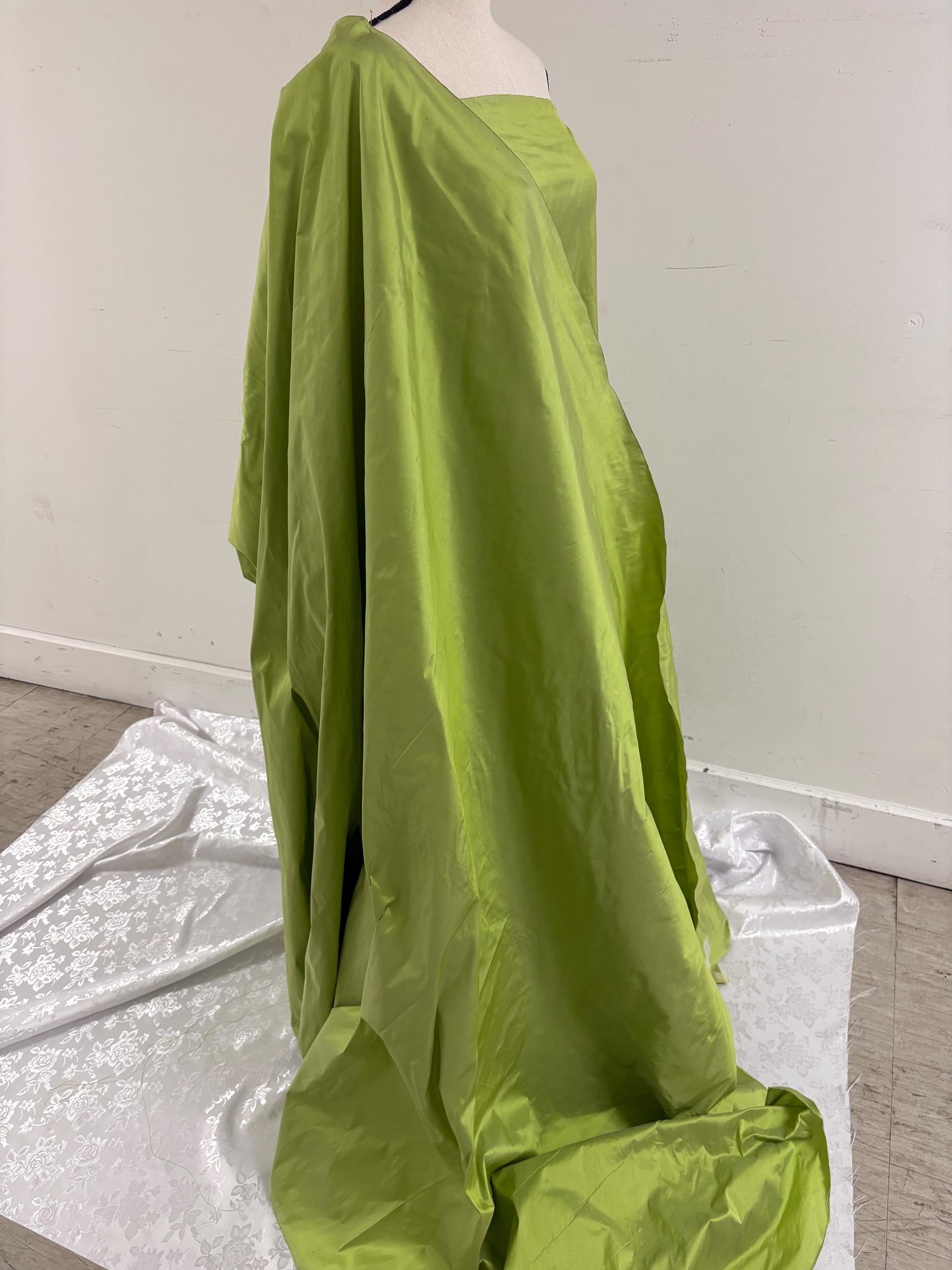 100% silk Dupioni Taffeta width 54" color lime sage. Machine made, fabric has slubbed. sell by 1 yard increment continuous. item # 1