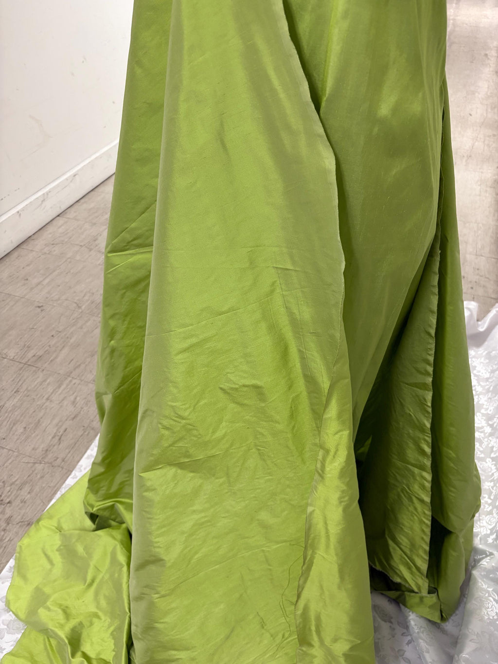 100% silk Dupioni Taffeta width 54" color lime sage. Machine made, fabric has slubbed. sell by 1 yard increment continuous. item # 1