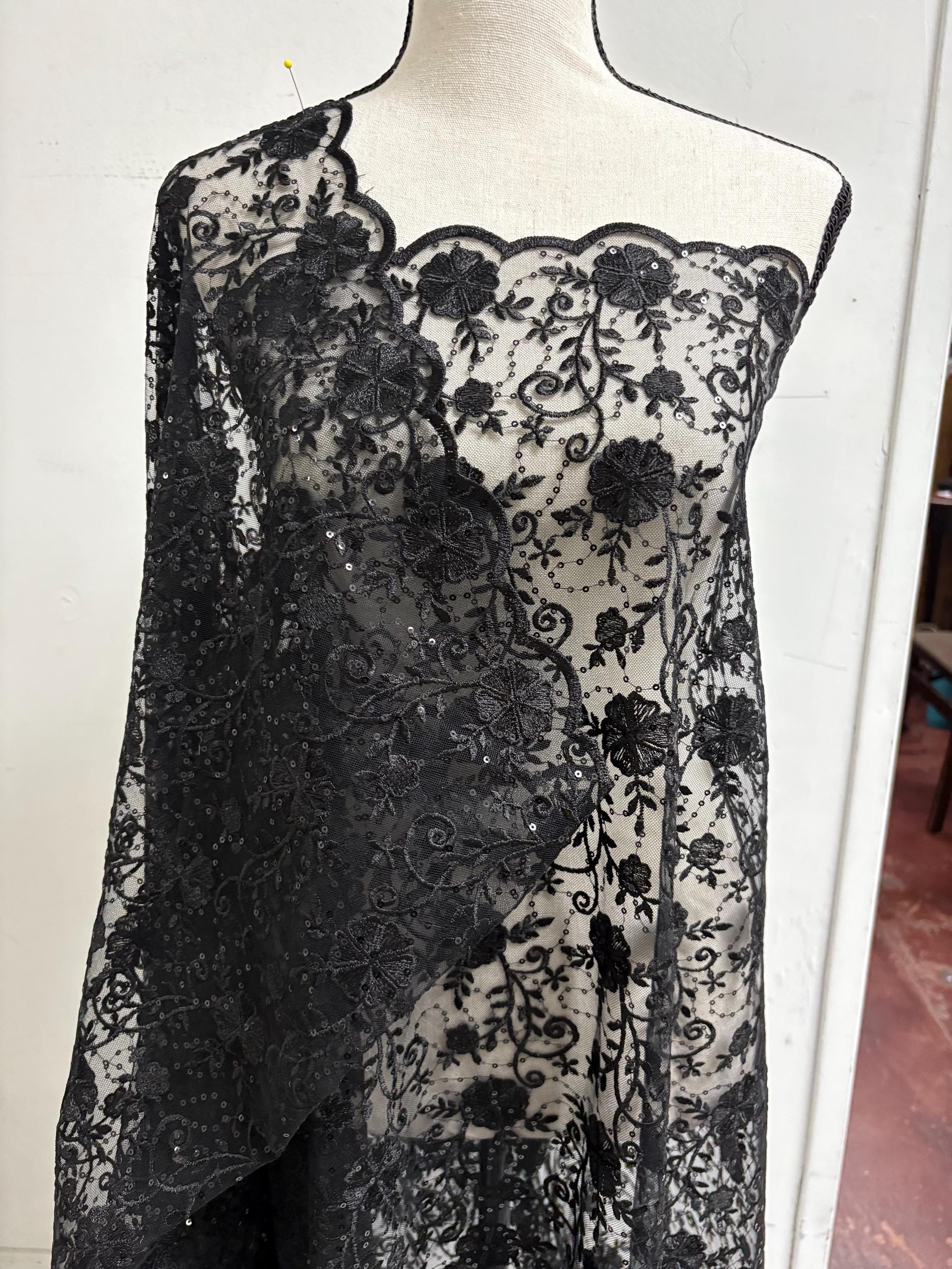 A 3-yard cut of Black Lace fabric with a width of 49/50 inches, featuring double scalloped embroidery and sequins. Design code: 04331279.