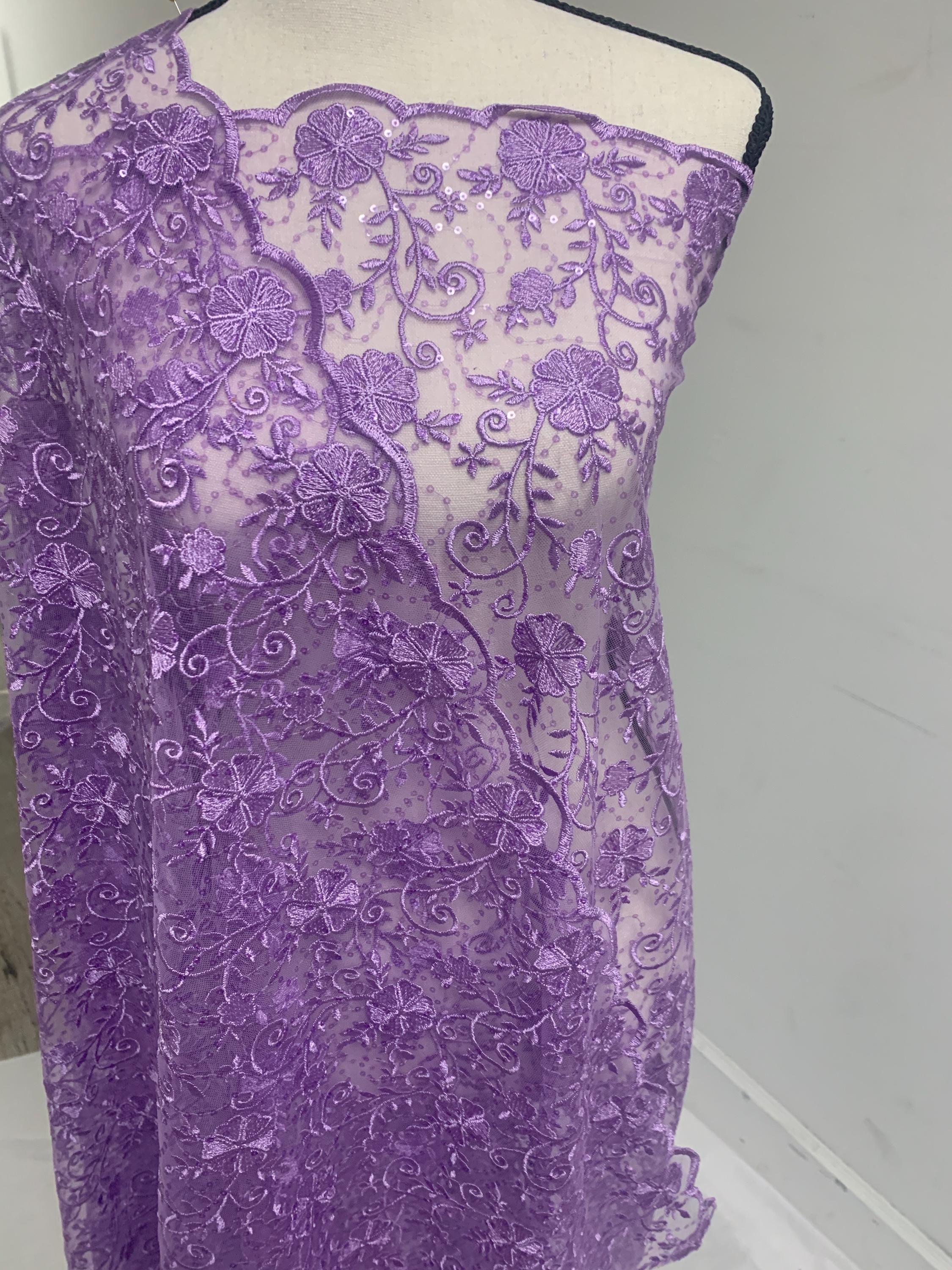 A 3-yard cut of Lilac Lace fabric with a width of 49/50 inches, featuring double scalloped embroidery and sequins. Design code: 04331279.