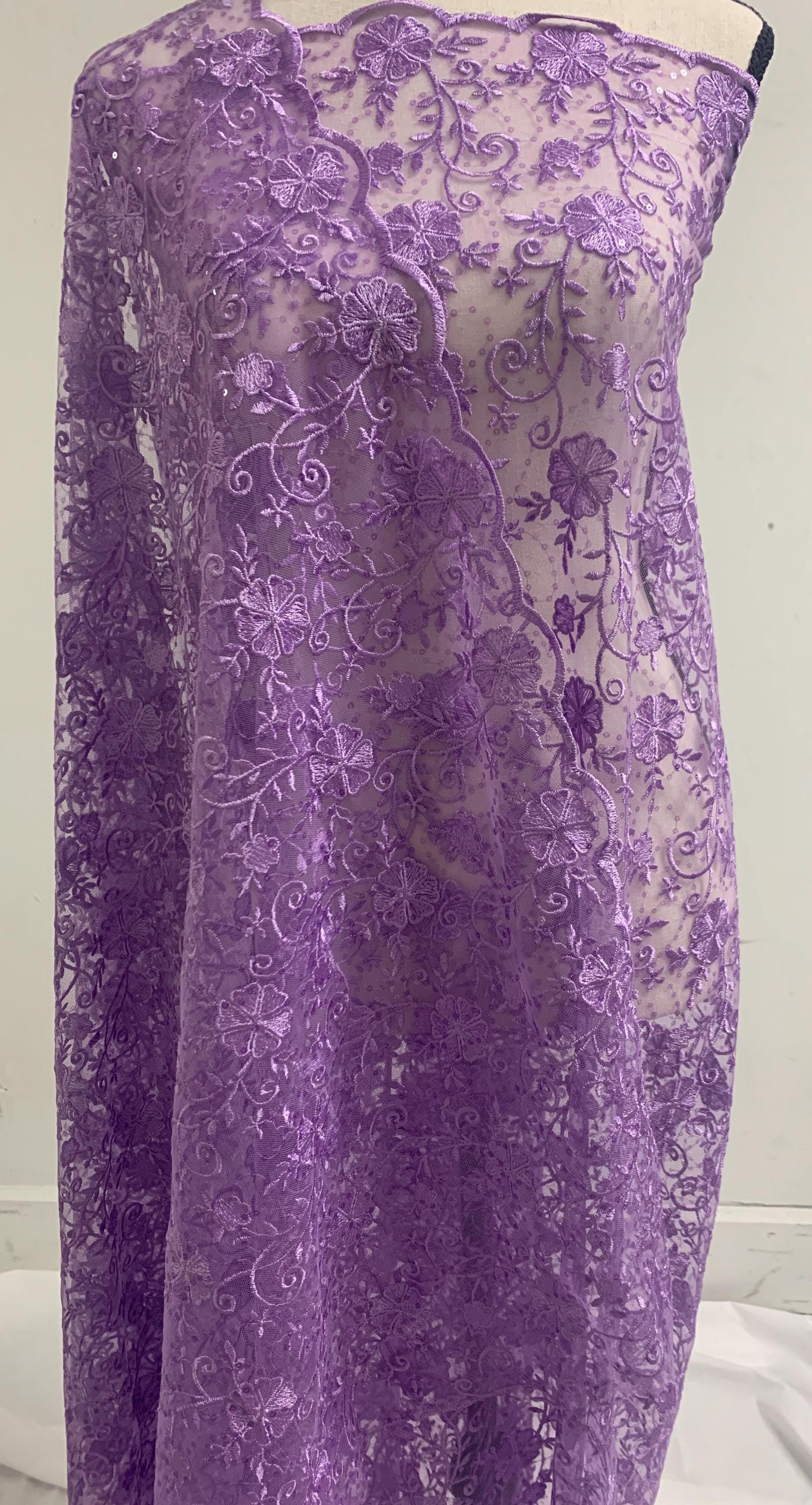 A 3-yard cut of Lilac Lace fabric with a width of 49/50 inches, featuring double scalloped embroidery and sequins. Design code: 04331279.