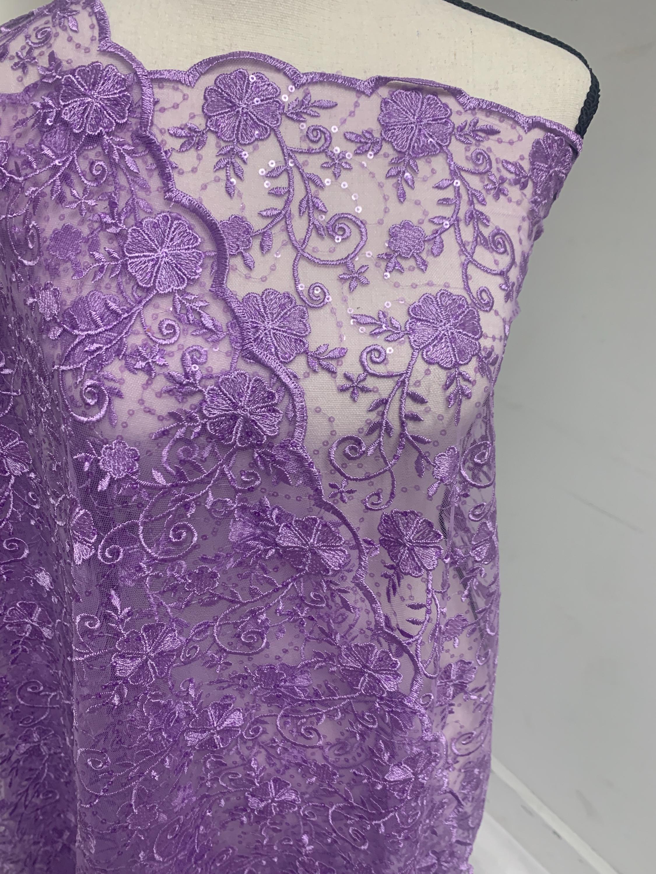 A 3-yard cut of Lilac Lace fabric with a width of 49/50 inches, featuring double scalloped embroidery and sequins. Design code: 04331279.