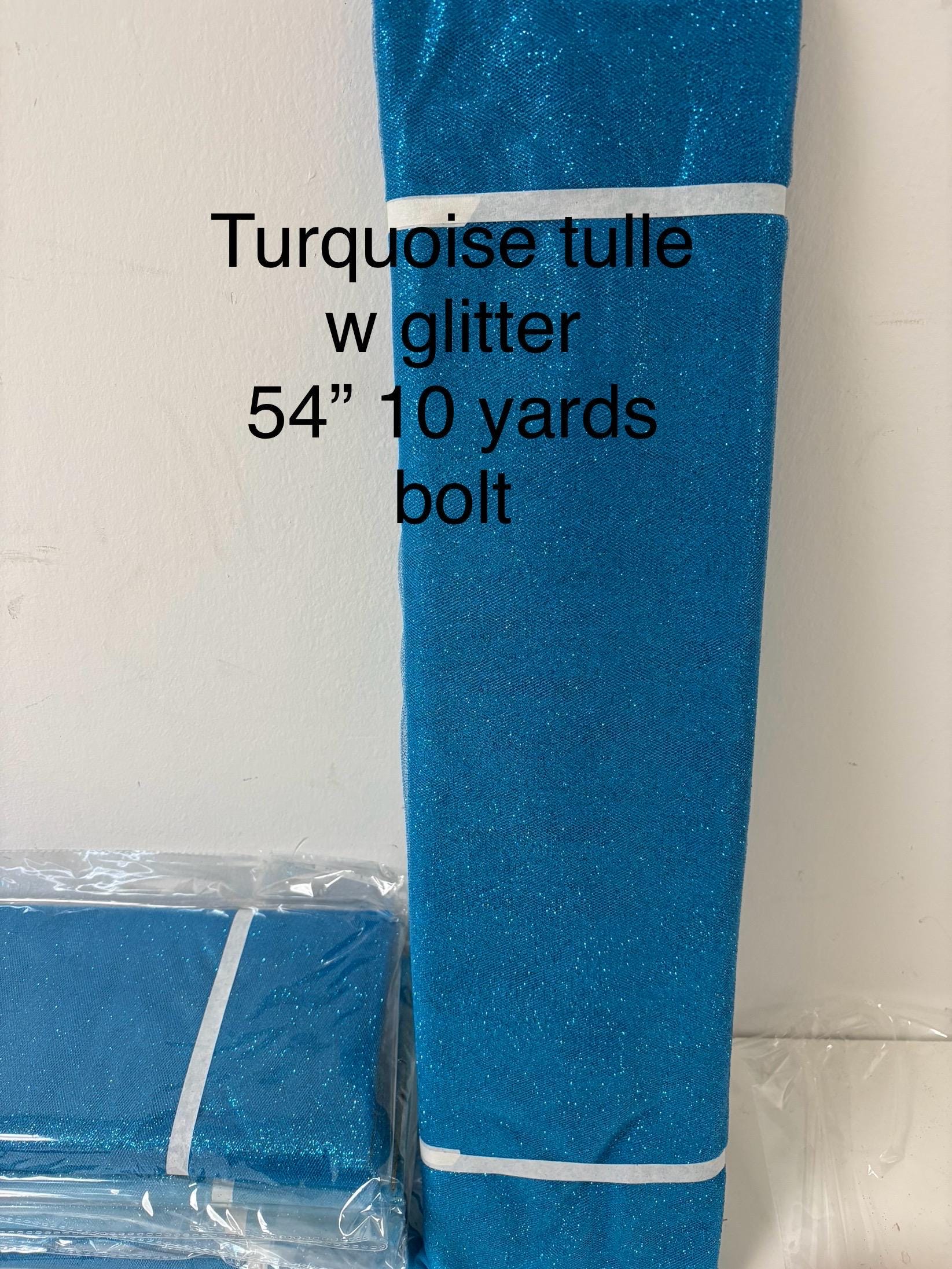 Tulle turquoise with Glitter 10 yards 54" double fold. 10 yards bolt.