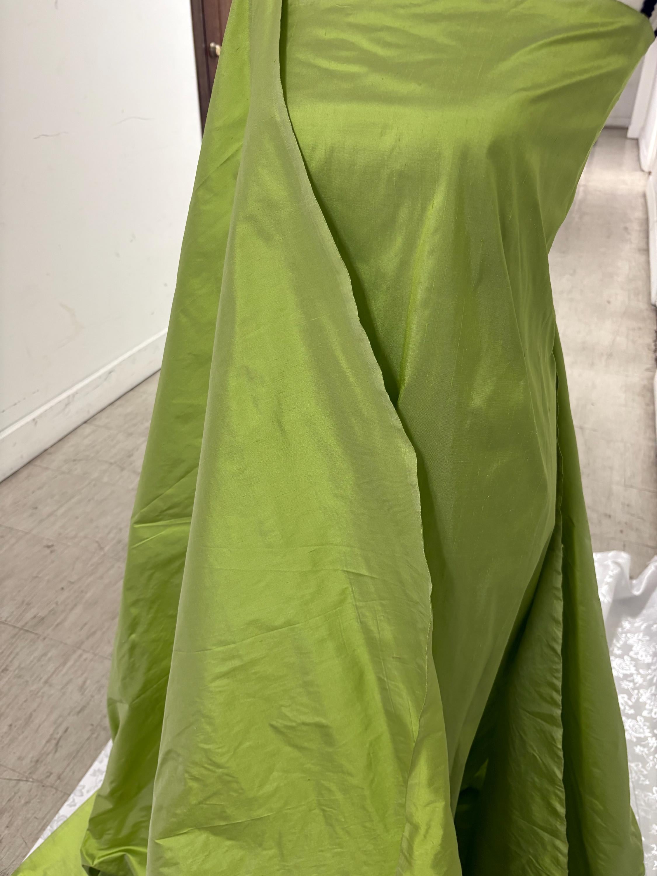 100% silk Dupioni Taffeta width 54" color lime sage. Machine made, fabric has slubbed. sell by 1 yard increment continuous. item # 1