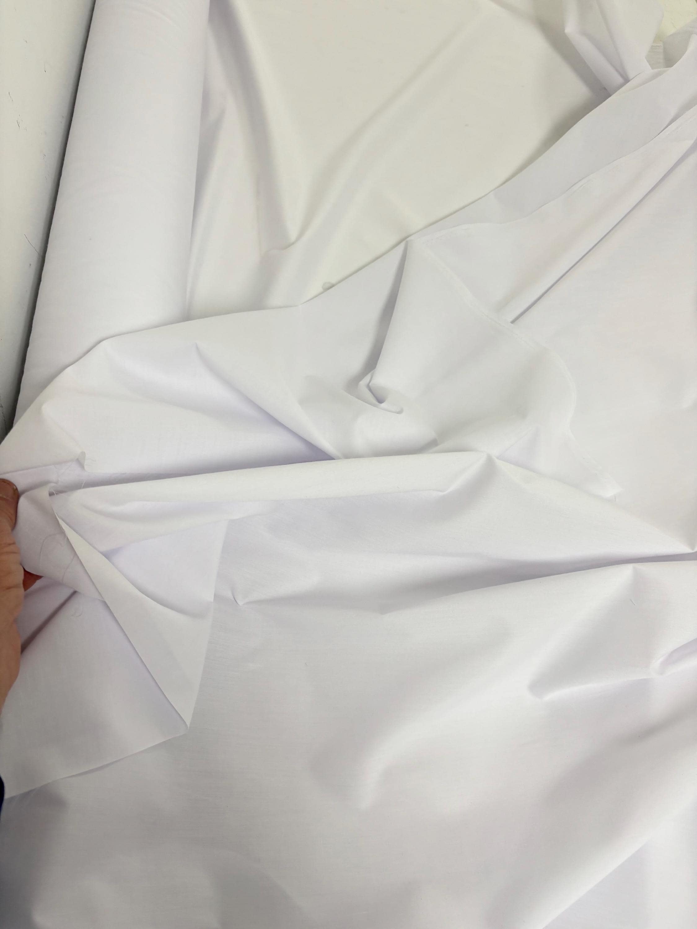A 3 yards white shirt fabric, poly cotton broadcloth sell by 3 yards increment continuous. width 58 inches, great item for Uniform, shirt.
