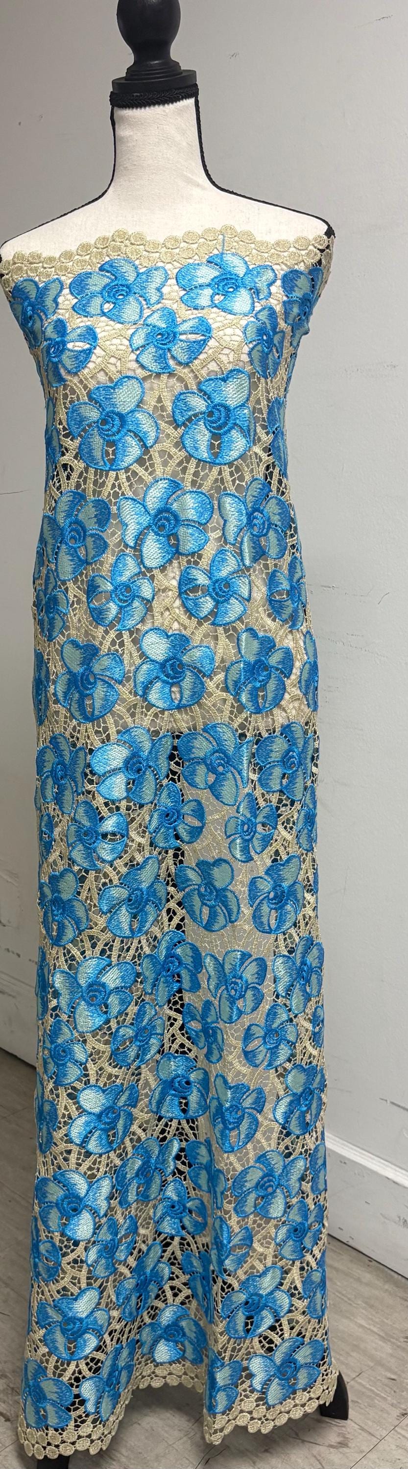 Guipure Lace Floral Embroidery Lace, width 49/50" sell by 1 yard increment. color Blue/light gold base. cut in continuous piece.