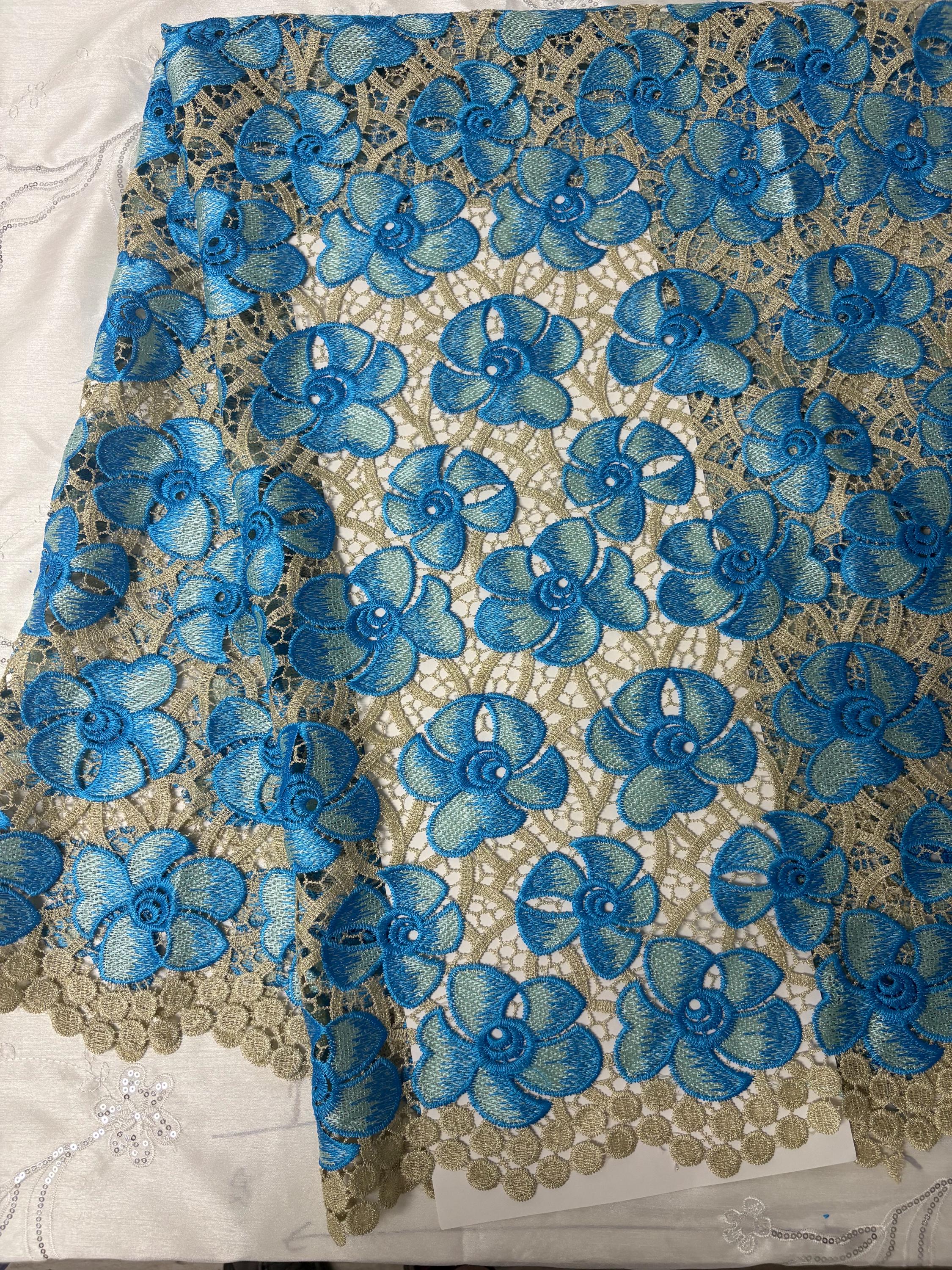 Guipure Lace Floral Embroidery Lace, width 49/50" sell by 1 yard increment. color Blue/light gold base. cut in continuous piece.