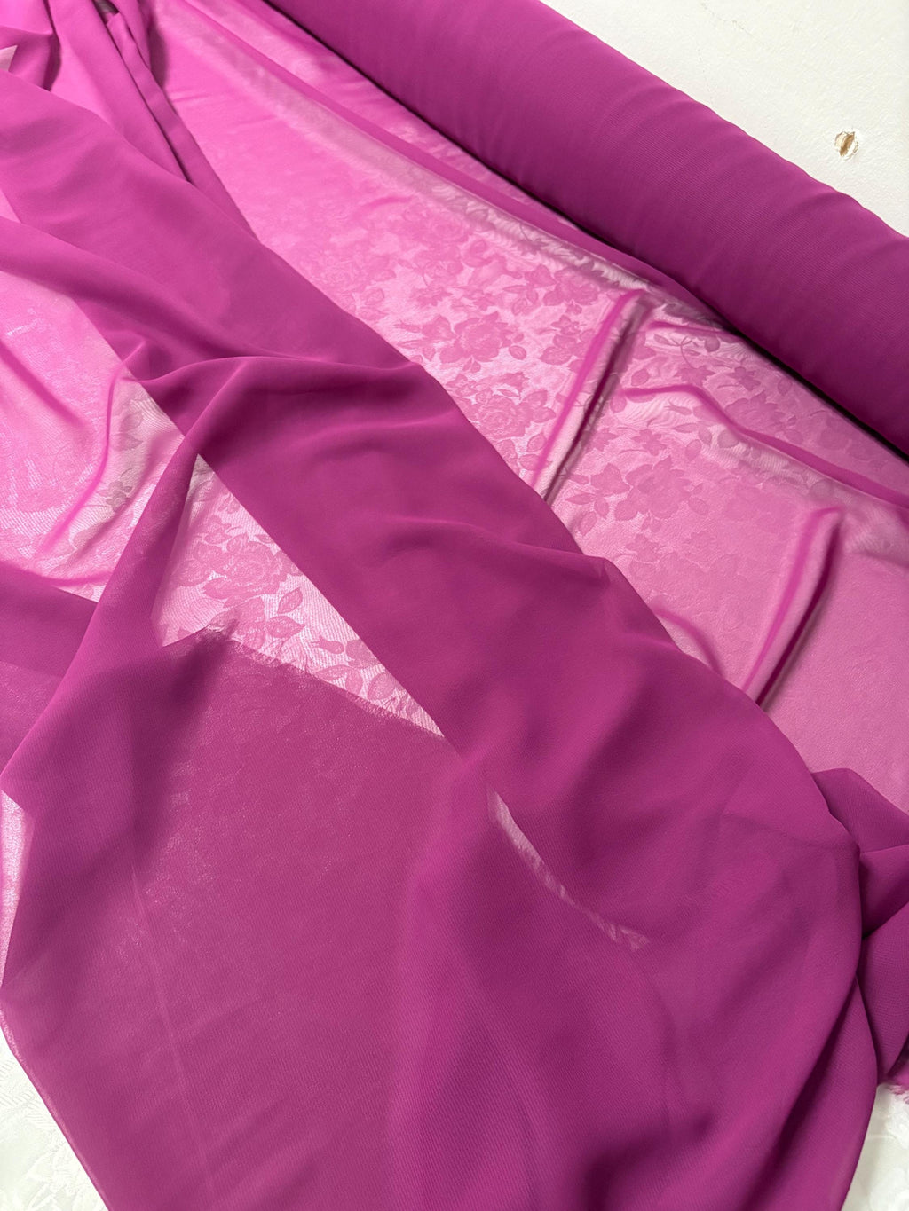 A 3 yard cut chiffon color Magenta width 58/60" wide, Polyester. sell by 3 yards increment continuous. Scarves, Dress and lingerie wear. fla