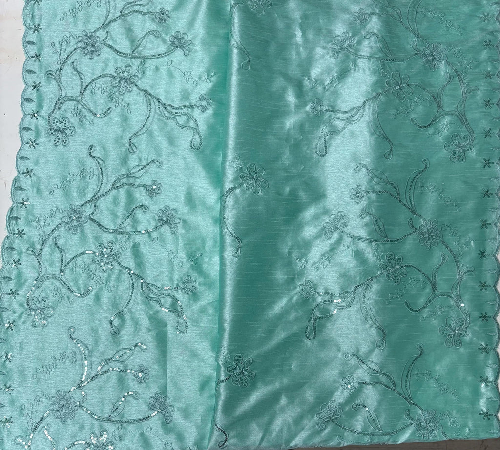 A 3 yards Tiffany satin Shantung Fabric width 58 inches polyester. Double scalloped sequins embroidery with slubbed texture.
