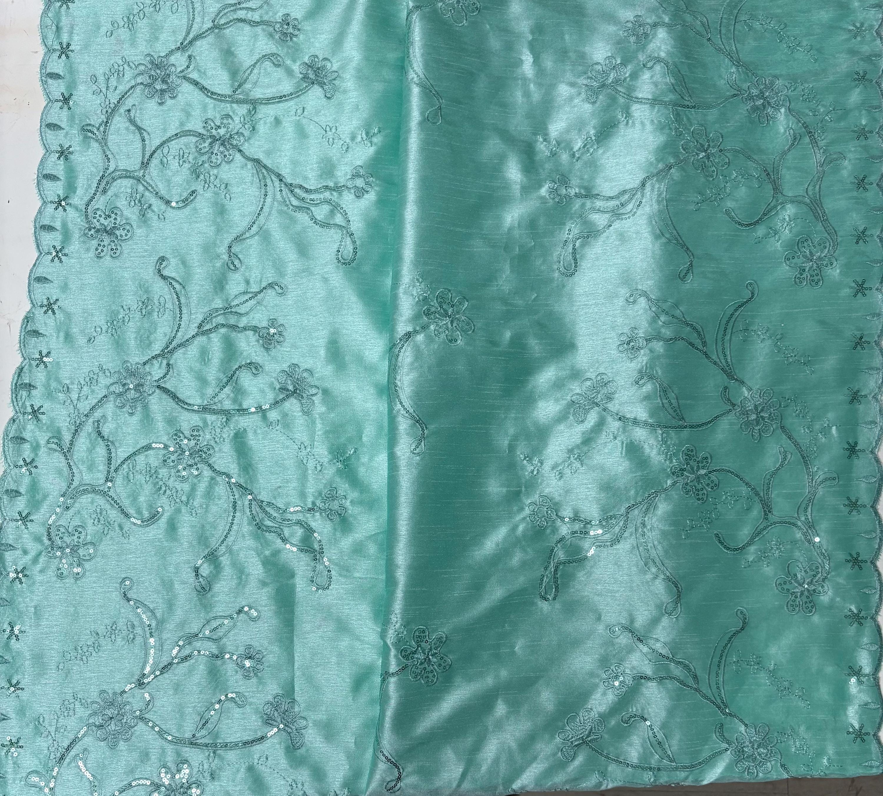 A 3 yards Tiffany satin Shantung Fabric width 58 inches polyester. Double scalloped sequins embroidery with slubbed texture.
