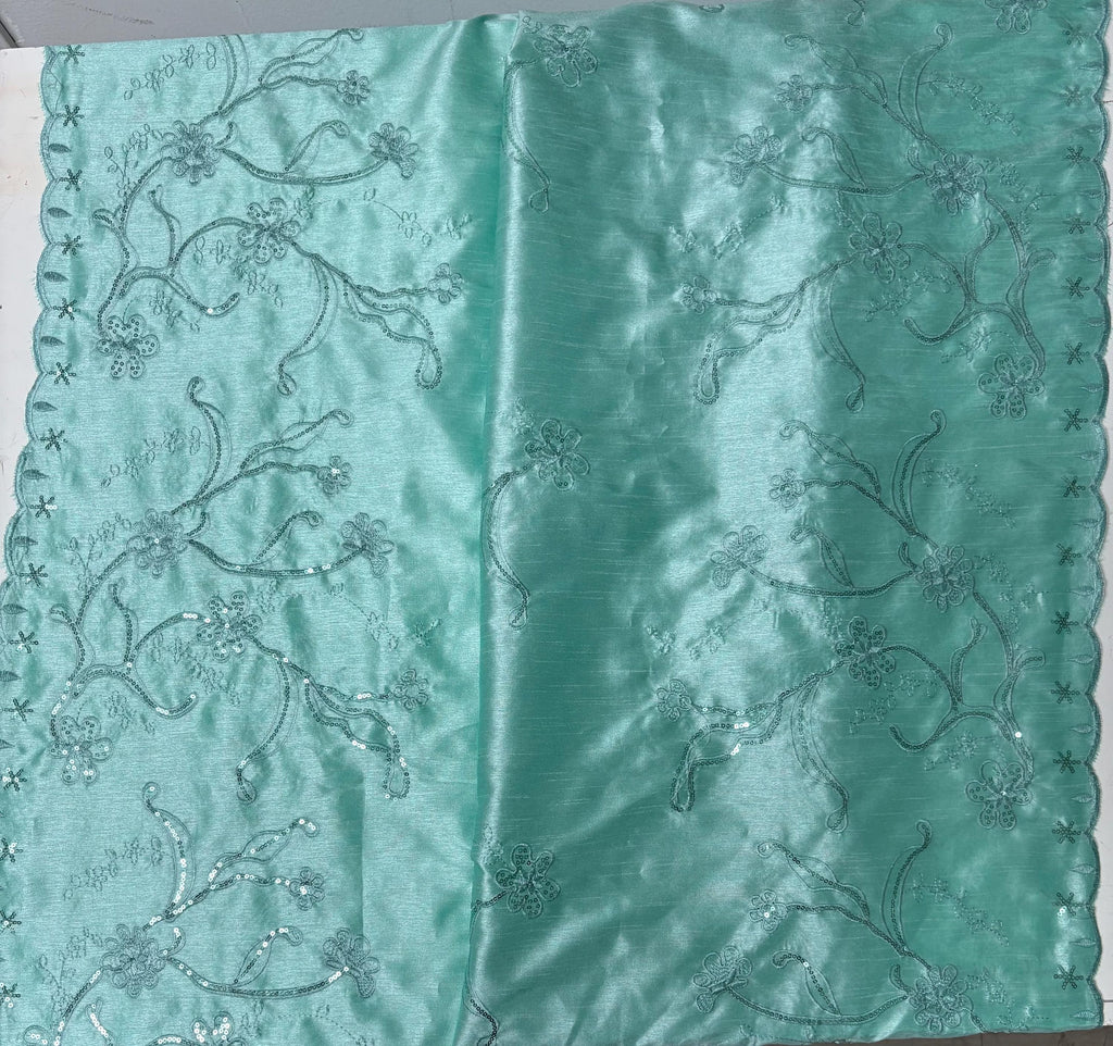 A 3 yards Tiffany satin Shantung Fabric width 58 inches polyester. Double scalloped sequins embroidery with slubbed texture.