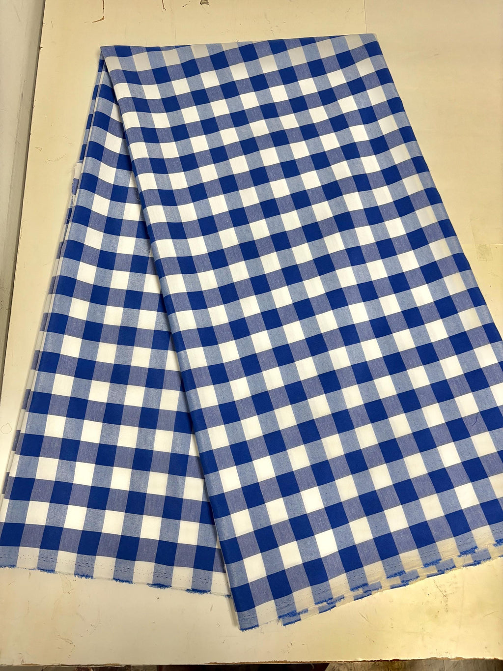 A 3 yards cut Royal blue Gingham fabric. Poly cotton, width 59". 1" square. will cut in 3 yards increment continuous.