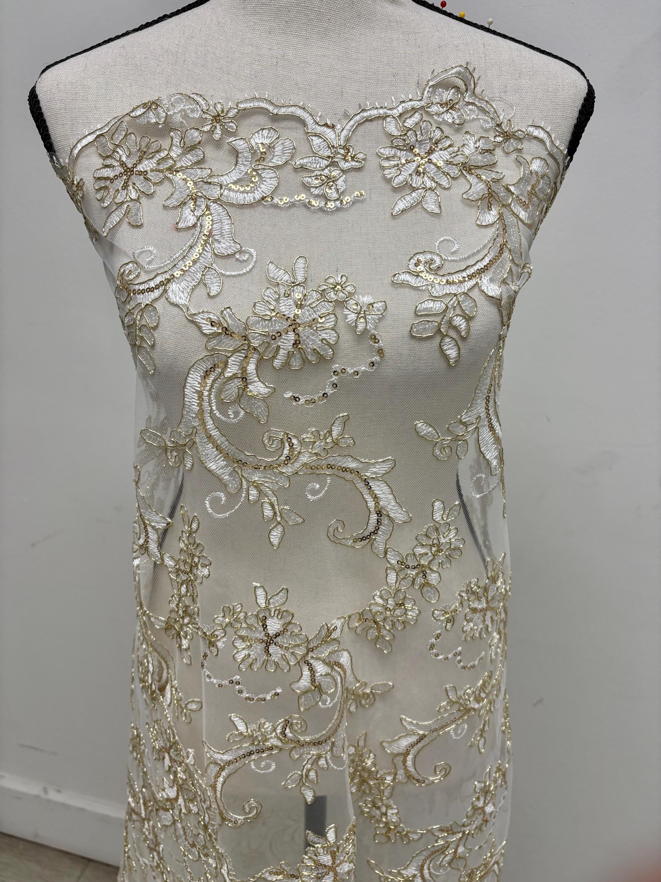 Ivory Gold lace fabric design yx846, sequins, embroidery double scalloped edges. Width 49/50".