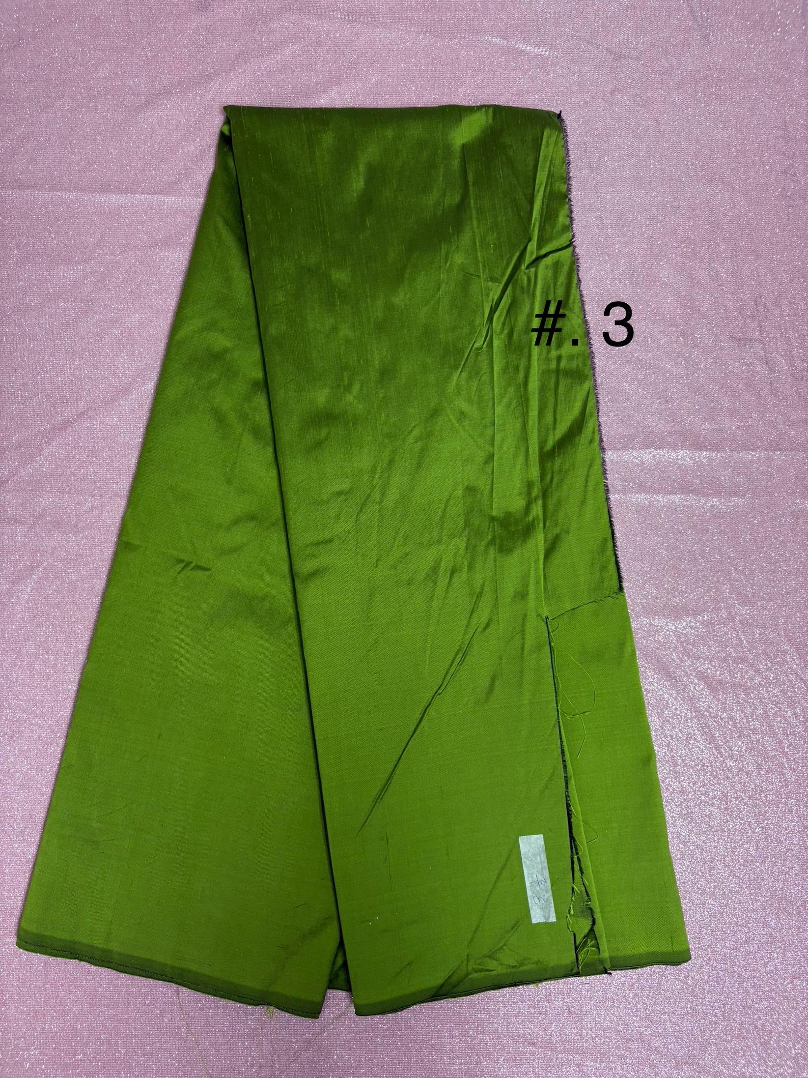 100% silk Dupioni Taffeta width 54" color is two tone Olive with black tone. Machine made, fabric has slubs. Item # 3. free sample.