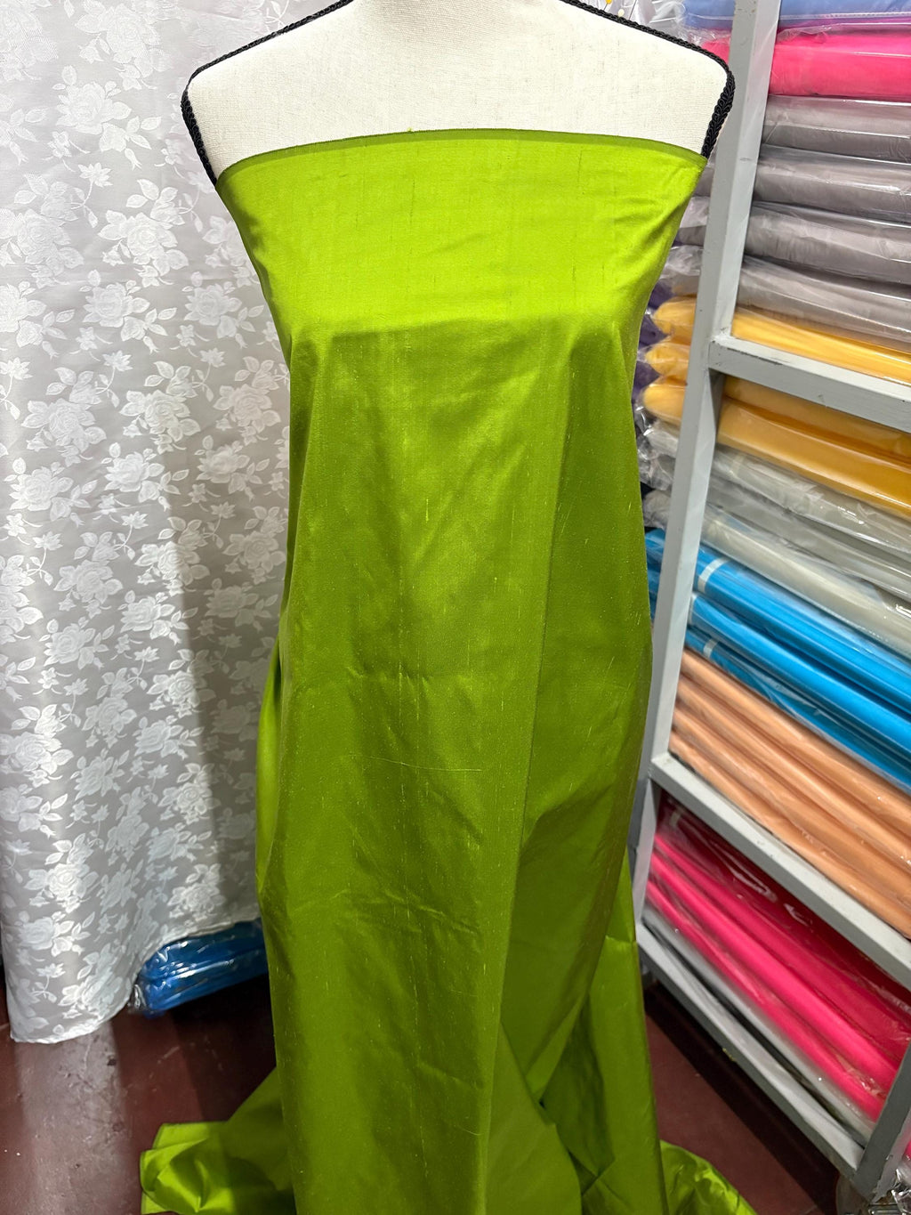 100% silk Dupioni Taffeta width 54" color is Lt.Olive. Machine made, fabric has slubs. Item # 4. free sample.