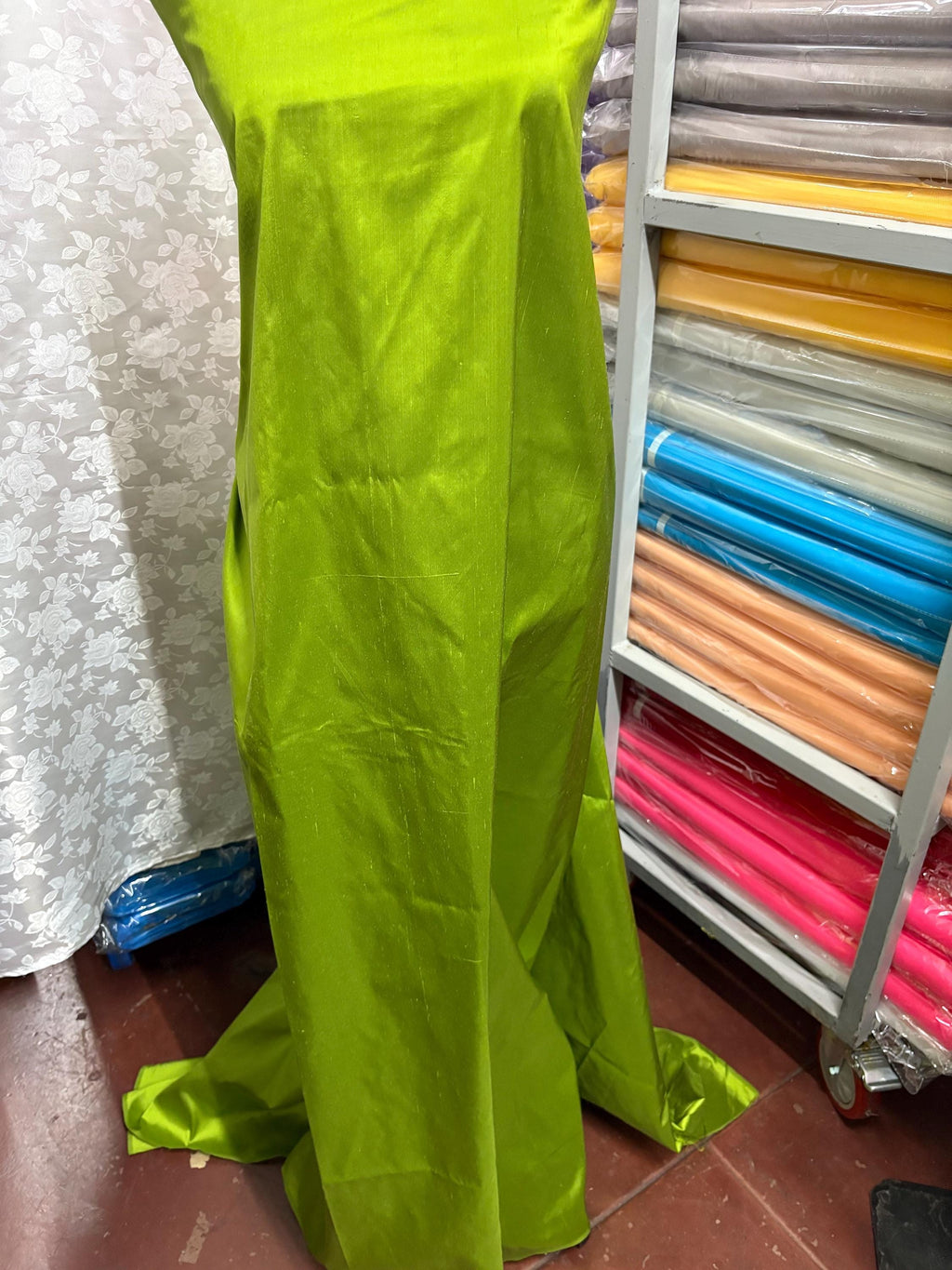 100% silk Dupioni Taffeta width 54" color is Lt.Olive. Machine made, fabric has slubs. Item # 4. free sample.