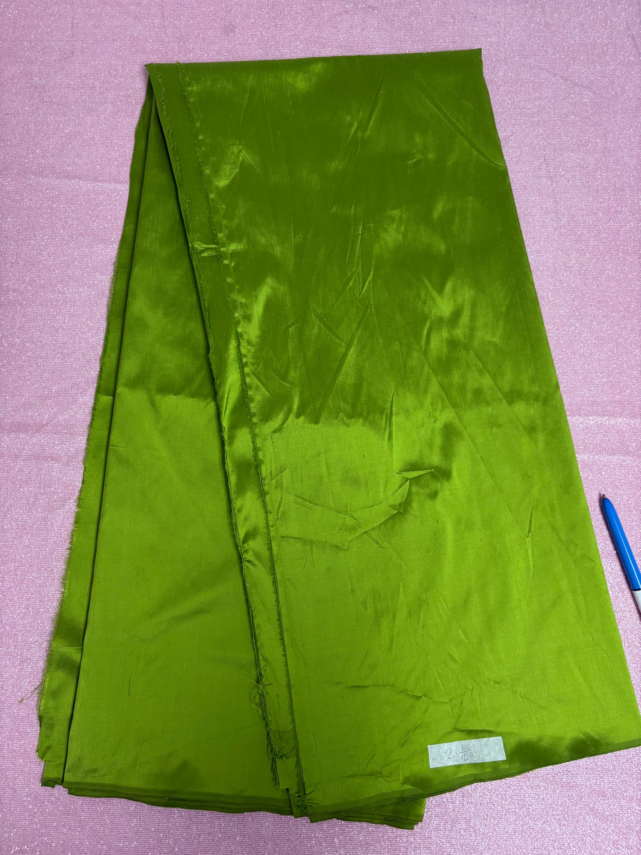 100% silk Dupioni Taffeta width 54" color is Lt.Olive. Machine made, fabric has slubs. Item # 4. free sample.