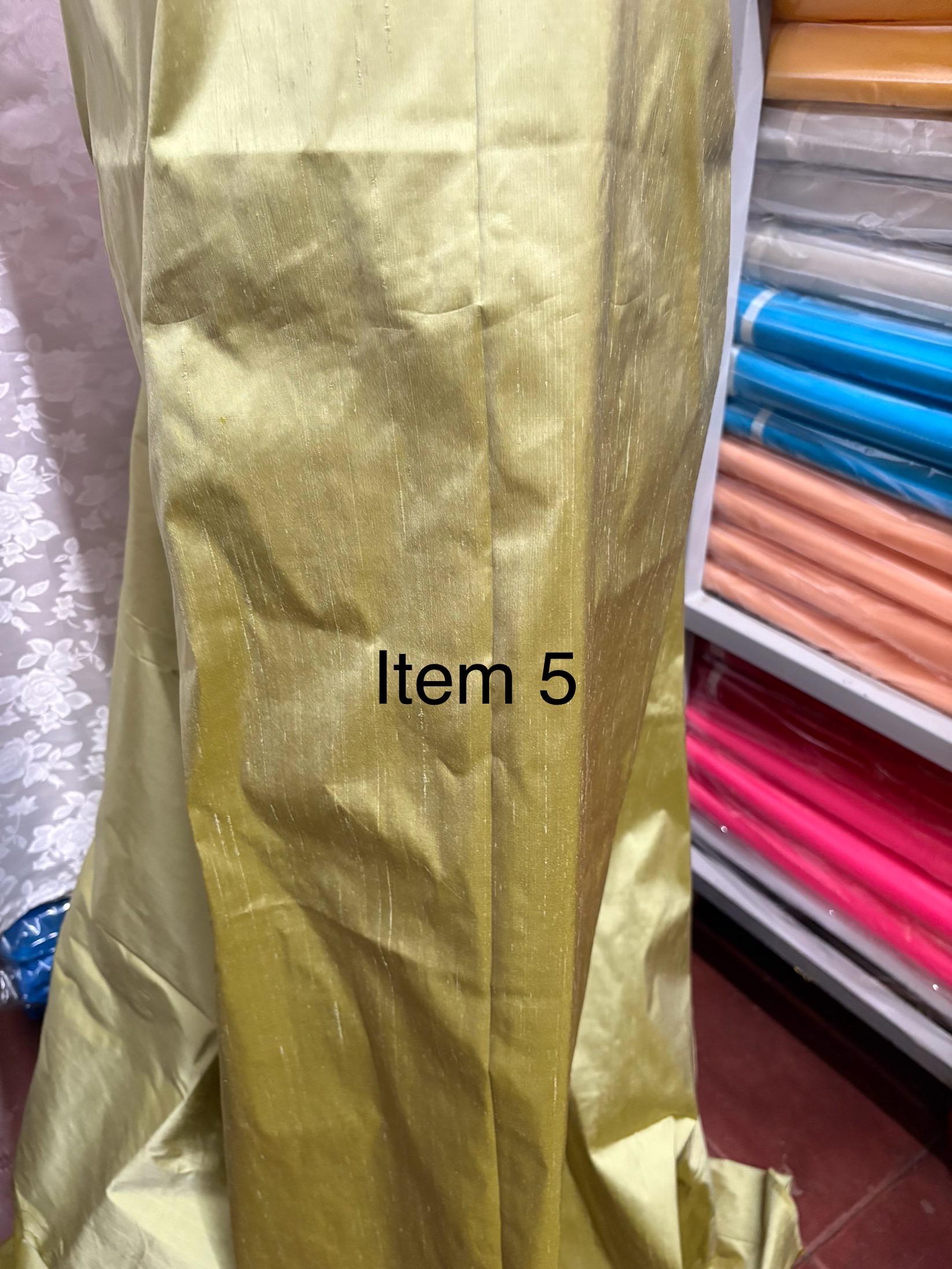100% silk Dupioni Taffeta width 54" color is Lt. Sage. Machine made, fabric has slubs. Item # 5. free sample.