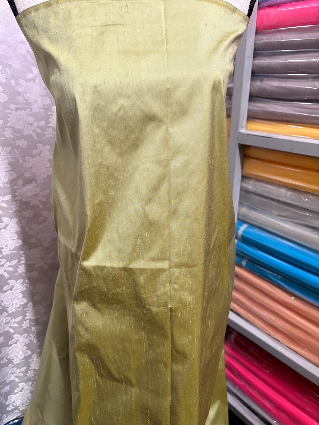 100% silk Dupioni Taffeta width 54" color is Lt. Sage. Machine made, fabric has slubs. Item # 5. free sample.