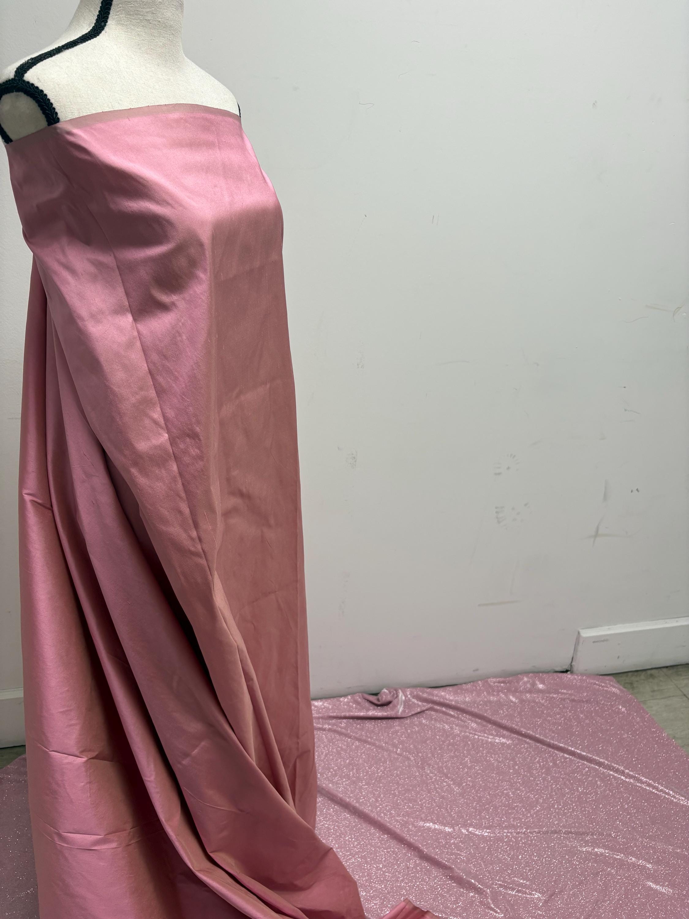 100% silk Dupioni Taffeta width 54" color is Rose sage. Machine made, fabric has slubs. Item # 9. Fabric has greenish tone.free sample.